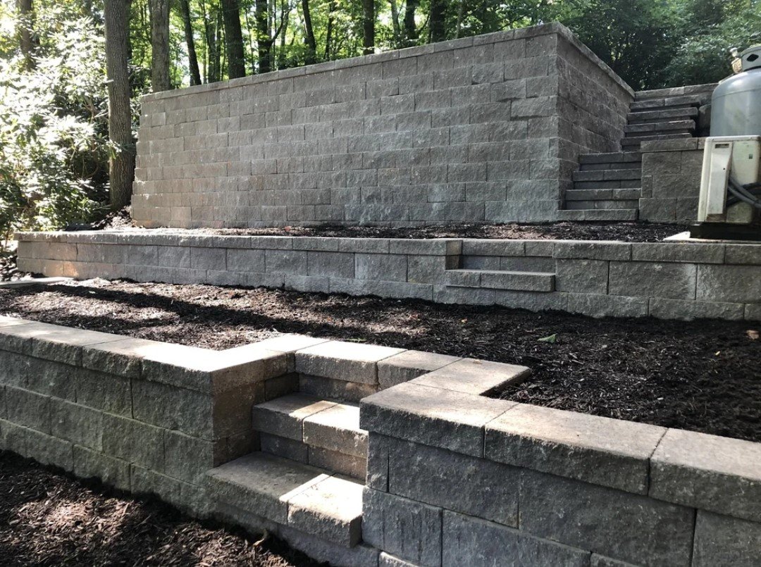 Learn how retaining walls help control erosion, improve drainage, and create functional outdoor spaces on sloped properties.
