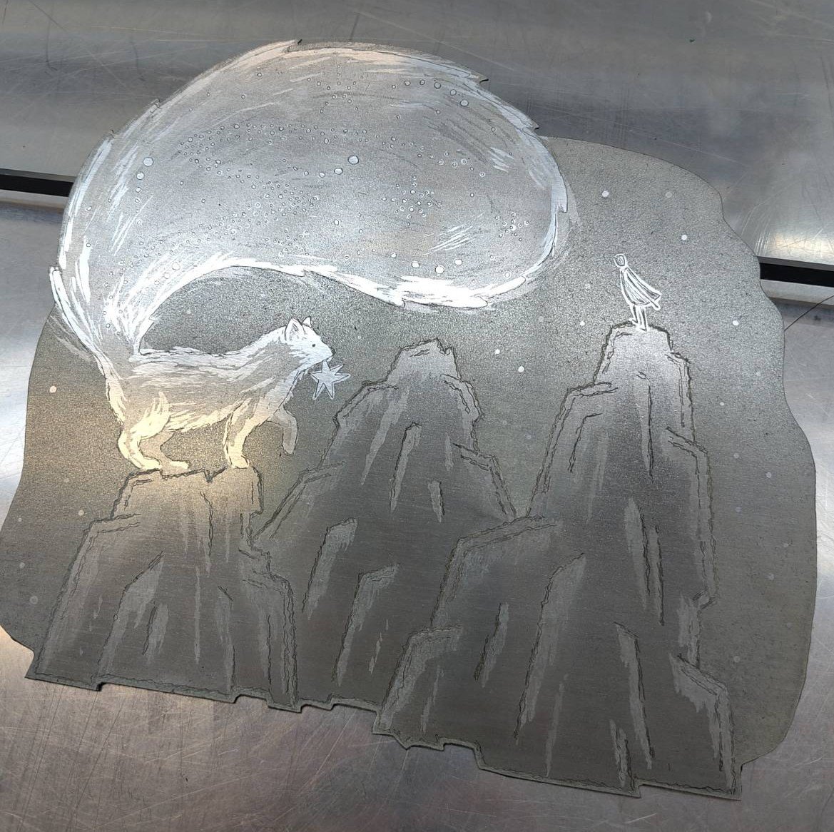 cut out zinc plate with etched fox and person on mountain tops