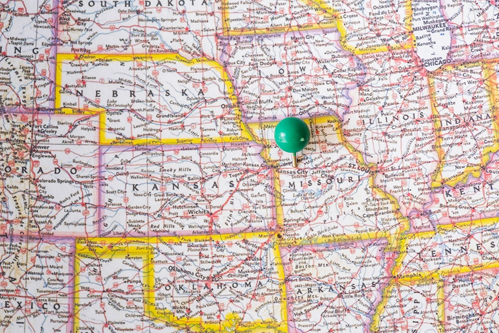 Map of the United States with a location marker, representing the operational planning and infrastructure needed to support expansion across multiple locations.