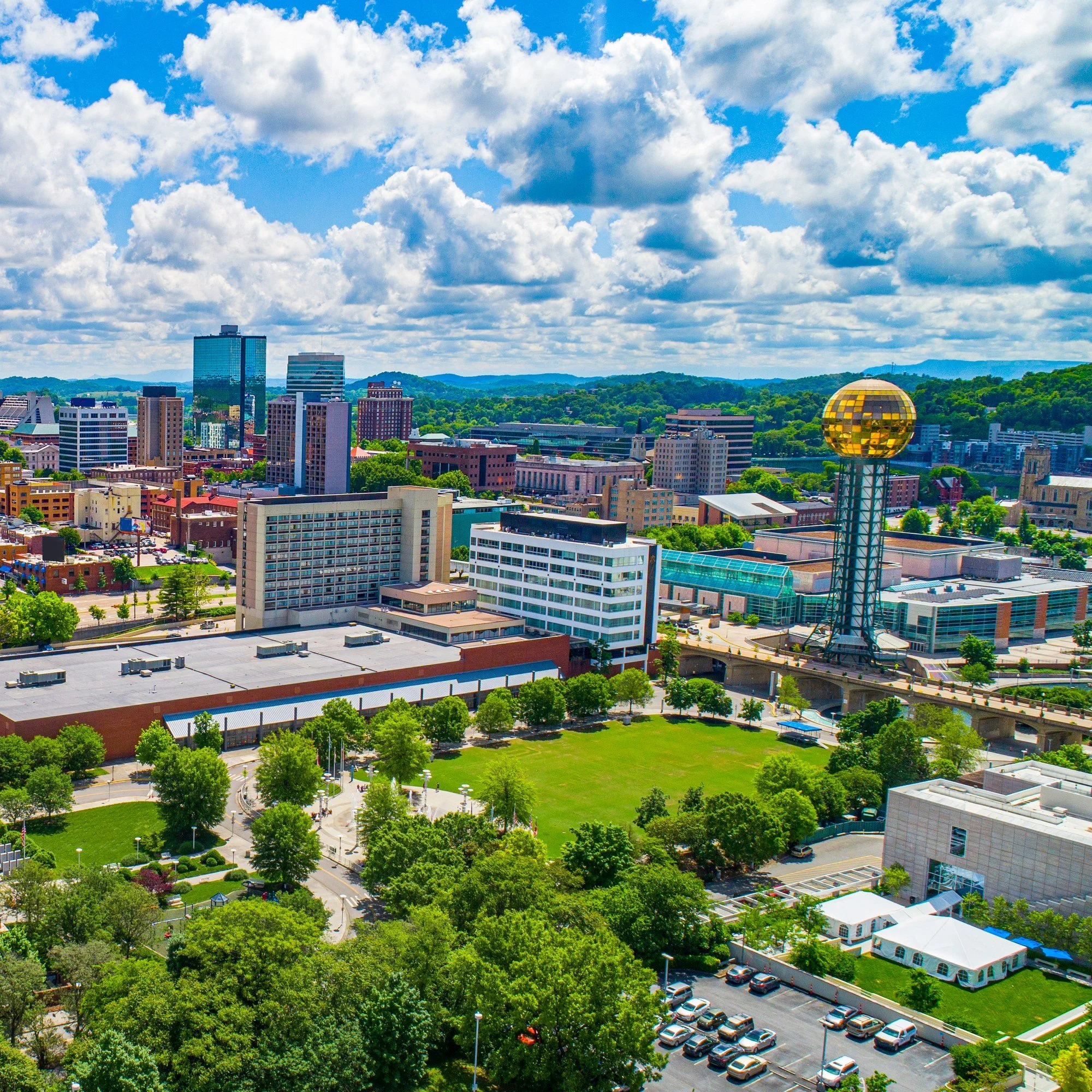 Aerial view of downtown Knoxville, Tennessee, with the gold Sunsphere tower.