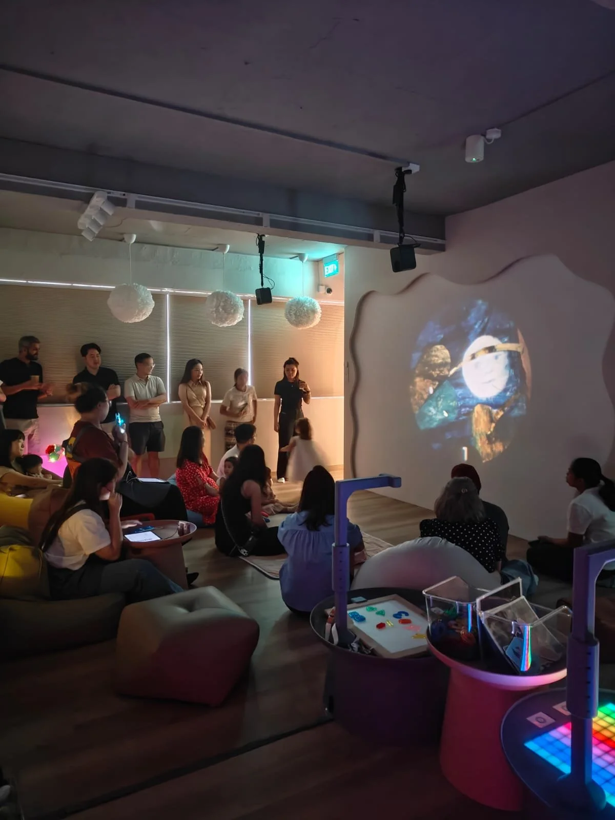 Projector room storytelling activity held at Riri's Children Playloft during a 4th birthday celebration. 