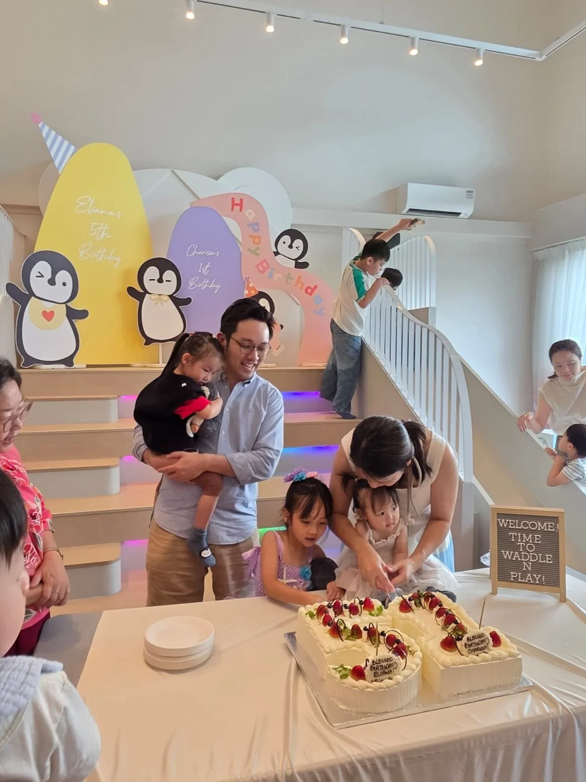 Family celebrating the 1st and 5th birthdays of their young daughters, at Riri's Children Playloft, an aesthetic toy museum located at Upper Thomson. 