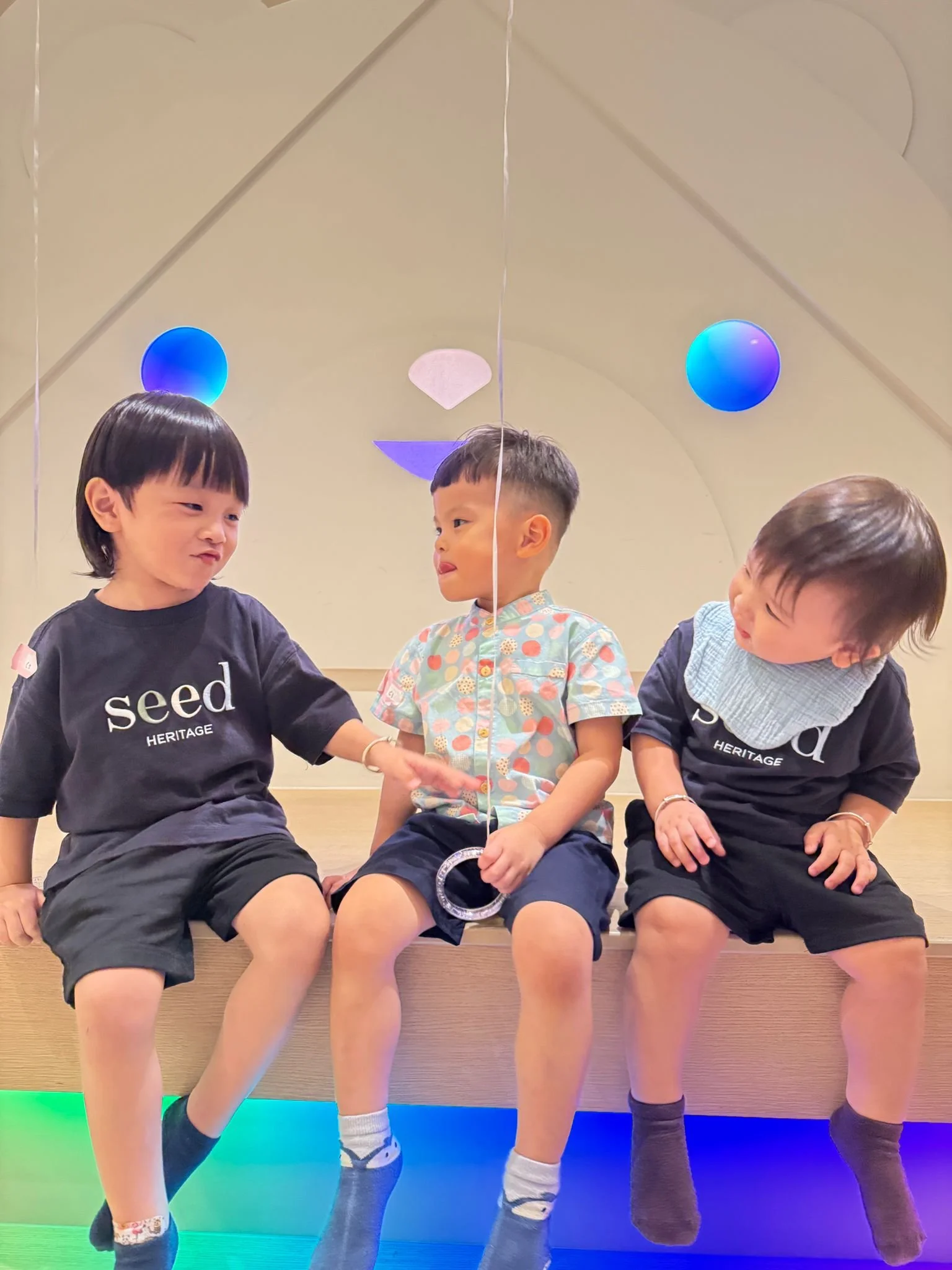 Children playing while celebrating the 2nd birthday of a pair of 2 year old twins at Riri’s Children Playloft, a calm indoor kids party venue in Singapore.