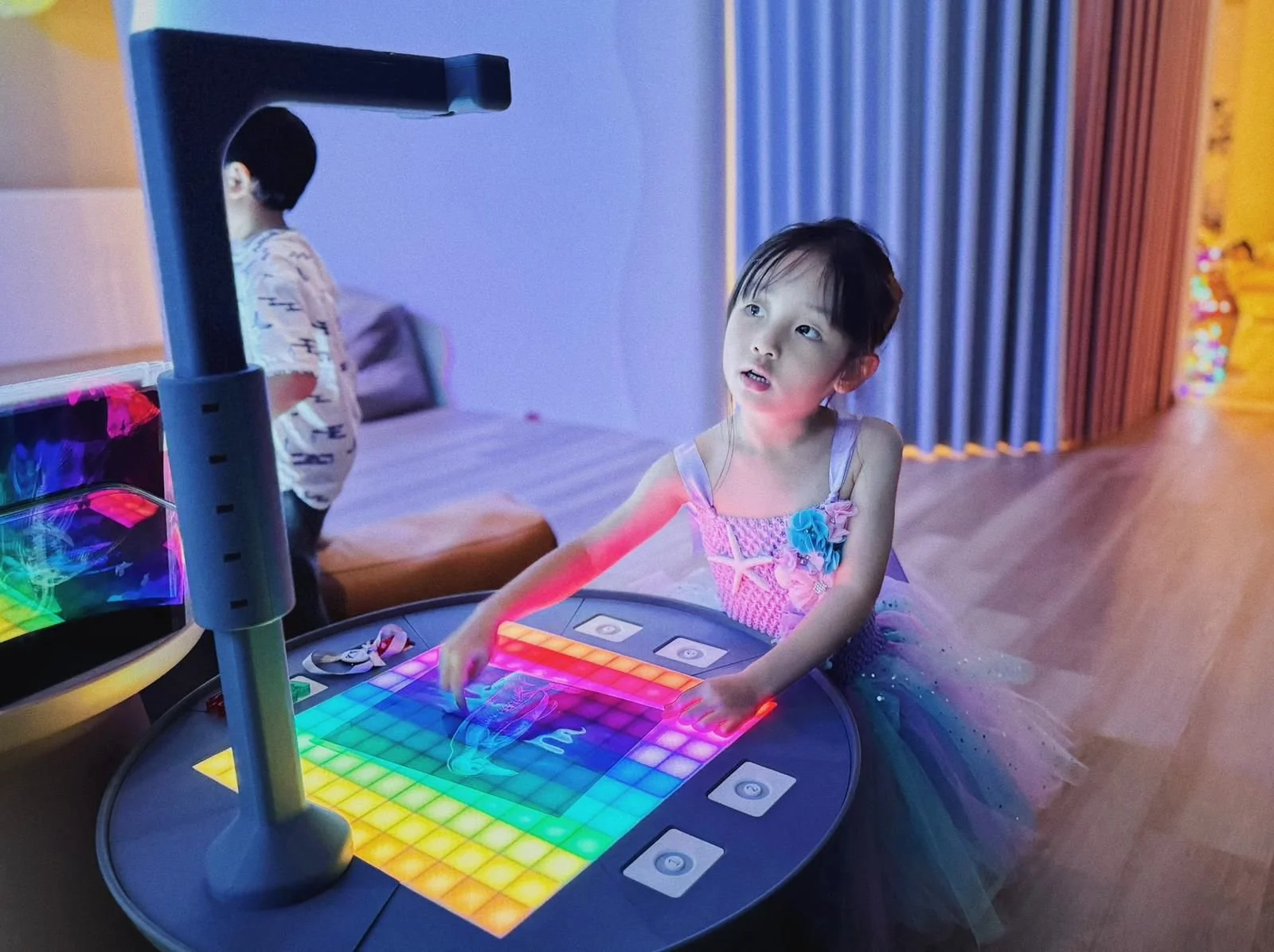 Children playing while celebrating a 1st and 5th birthday party at Riri’s Children Playloft, a calm indoor kids party venue in Singapore.
