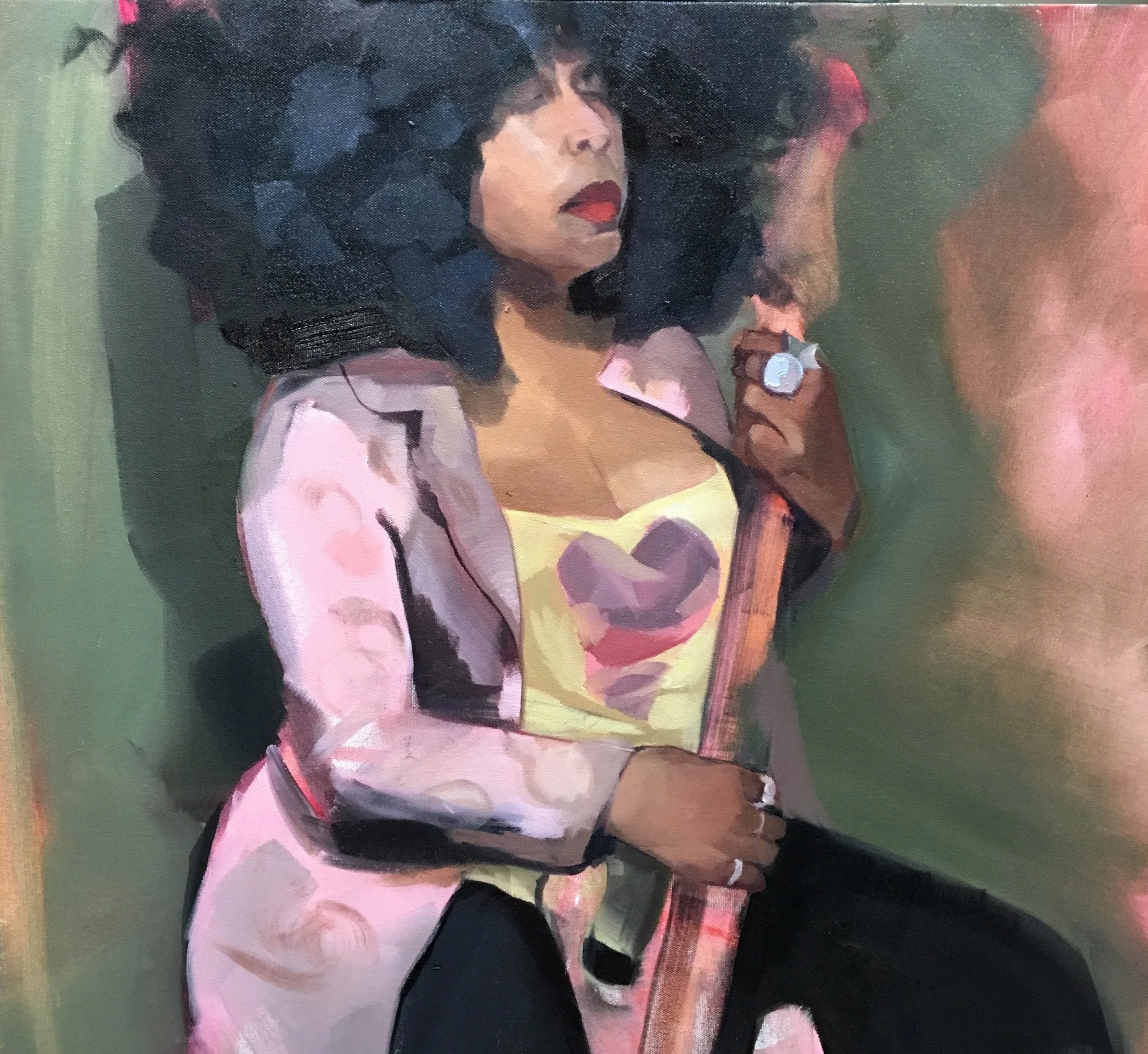 Painting of NYC musician Crystal Clear with dark curly hair, wearing a pink jacket and a yellow shirt with a heart-shaped design, holding her guitar. She has red lipstick and rings on her fingers.