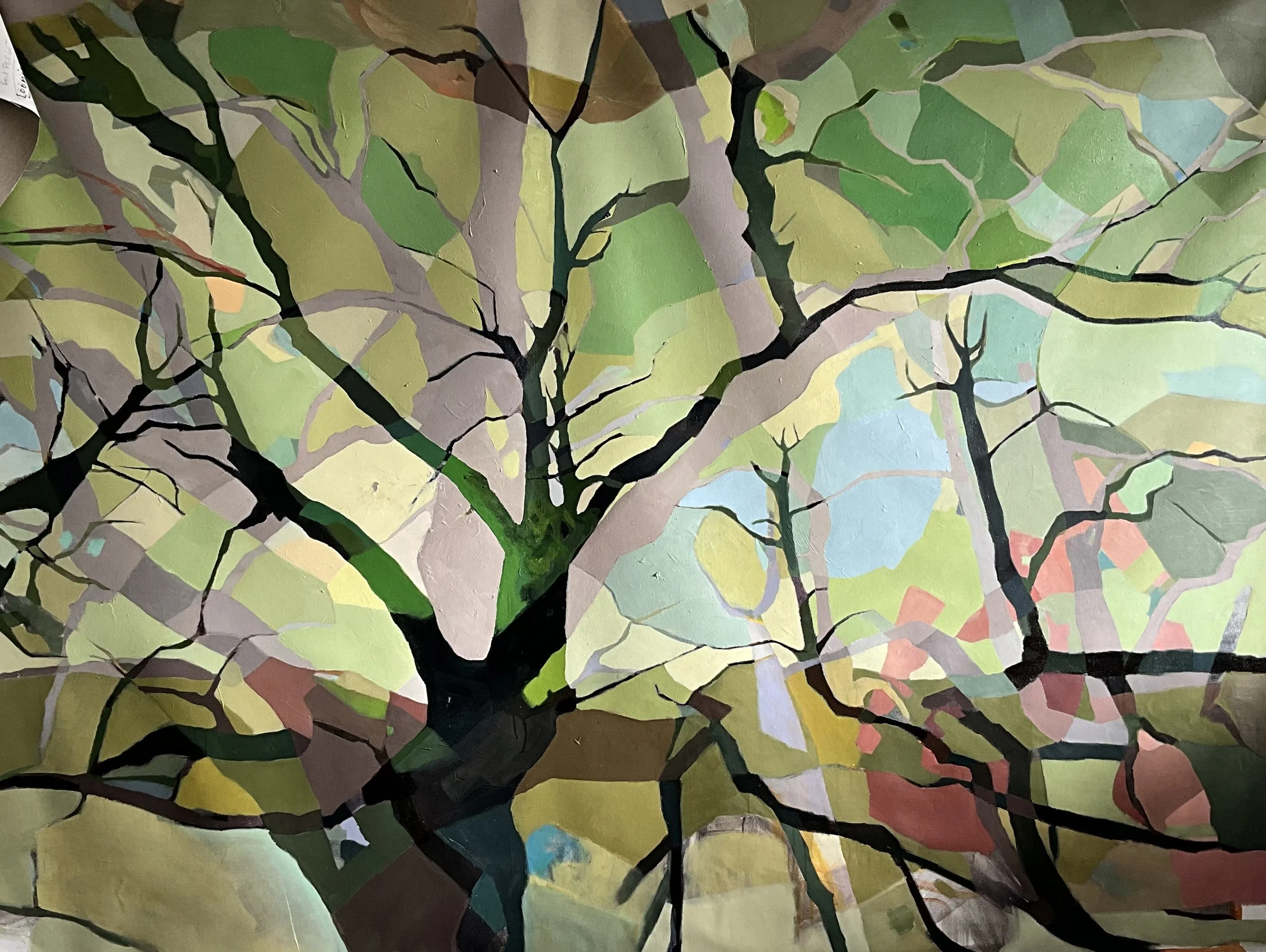Painted depiction of a tree with black branches and green leaves, using a stained glass or mosaic style with multiple colored segments.