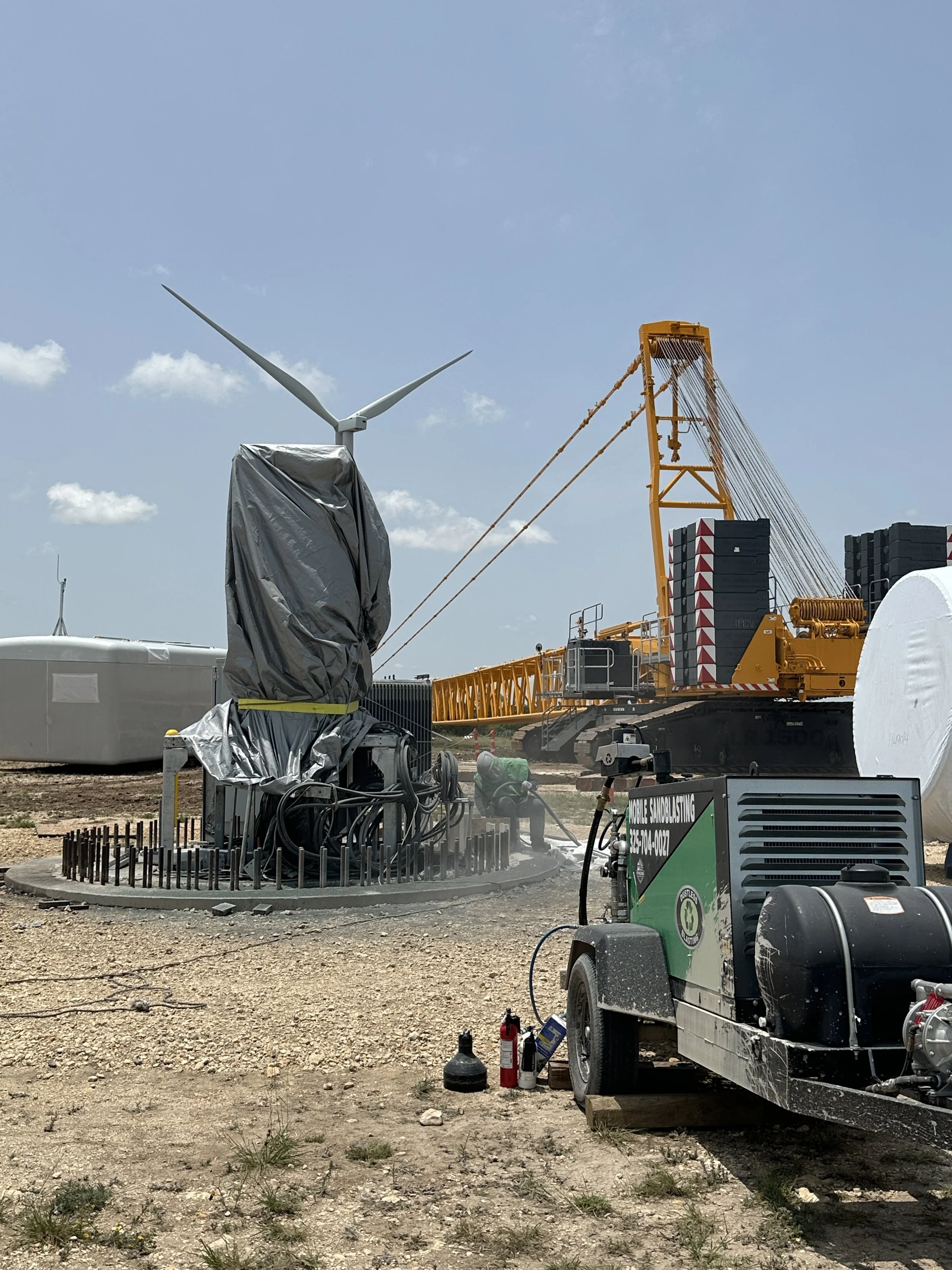 sandblasting wind turbine concrete.JPG