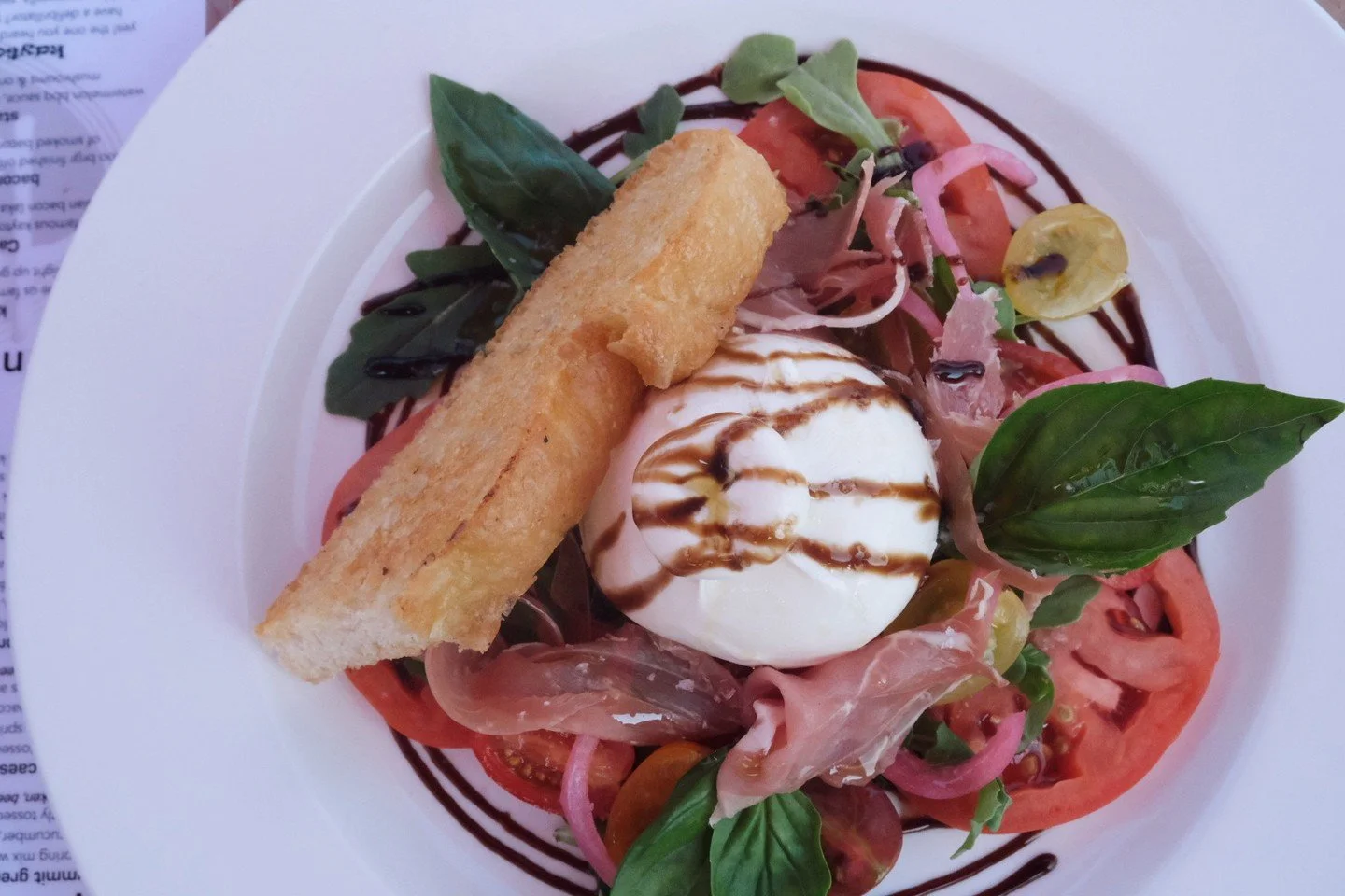 Fresh, creamy, and oh-so-delicious! 🥗 Enjoy our burrata salad with ripe, juicy tomatoes&mdash;the perfect way to start your meal.⁠
⁠
#kaytooatblue #bluemountainvillage