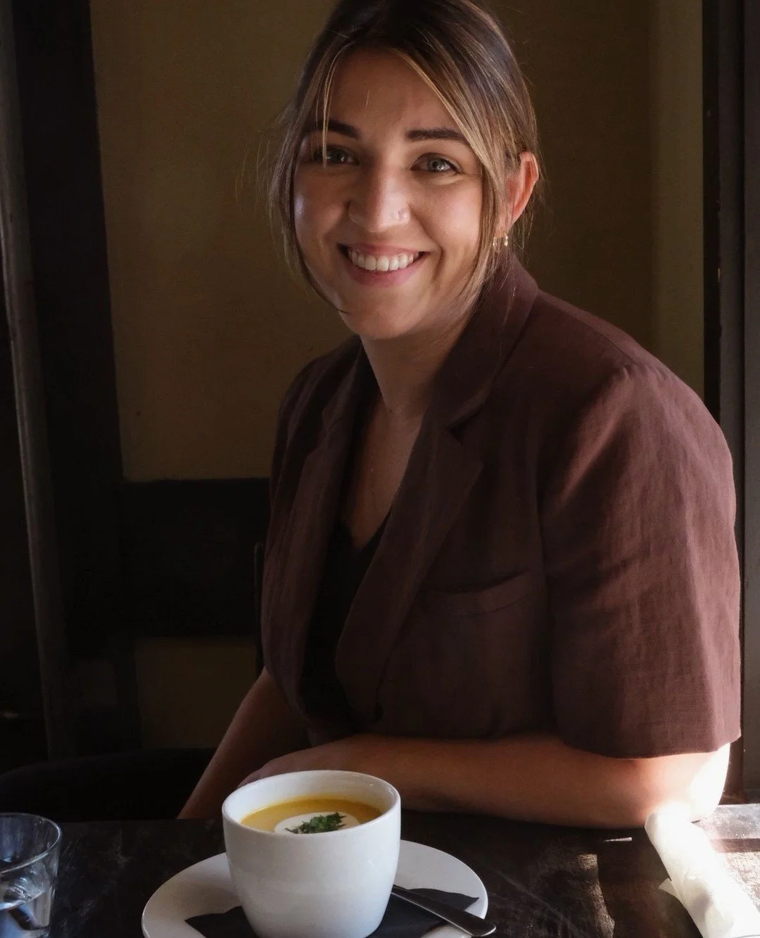 Our event director Magda and a bowl of Chef Johnny's Fallicious roasted butternut squash soup 😍⁠
⁠
#kaytooatblue #fallicious