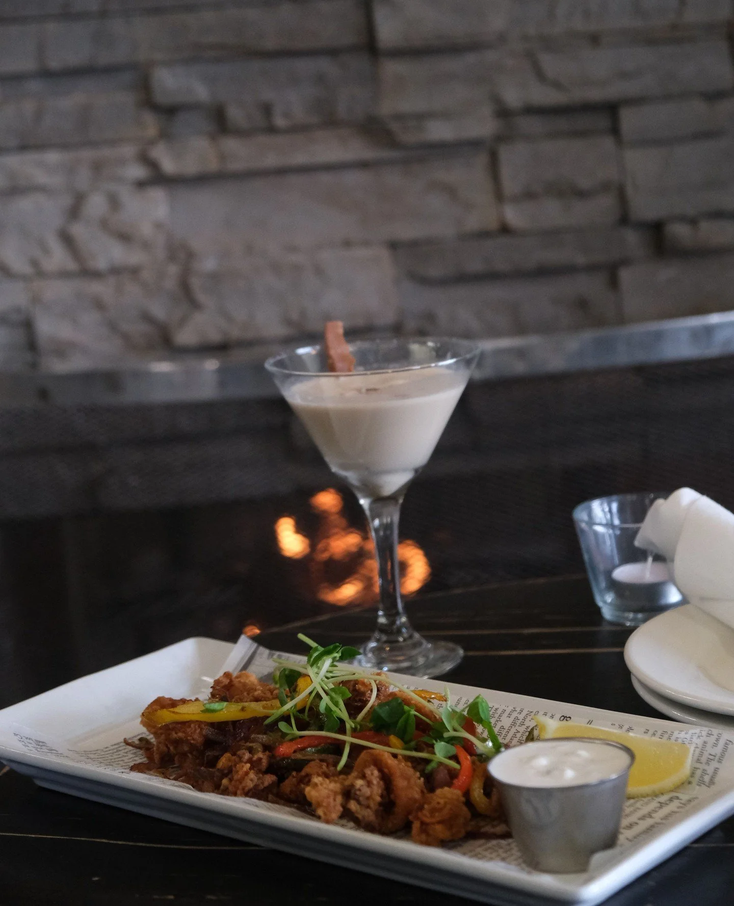Best way to warm up after a chilly day at the Blue Mountain Village? At Kaytoo, by the fire, with some crispy hand-breaded calamari 🔥⁠
⁠
Reserve your table at kaytoo.ca ⁠
⁠
#kaytooatblue #bluemountainvillage #apreski ⁠