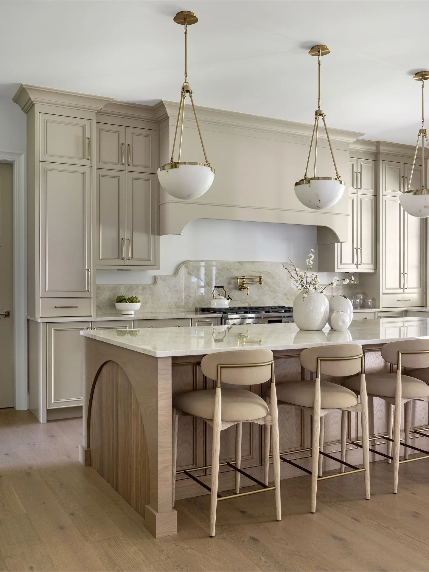 We named this project The Grand Tradition for a reason - refined elegance rooted in timeless, traditional design. The Taj Mahal countertops bring the perfect touch of understated luxury to this classic kitchen.

Interior Designer: @centrestagedesign 