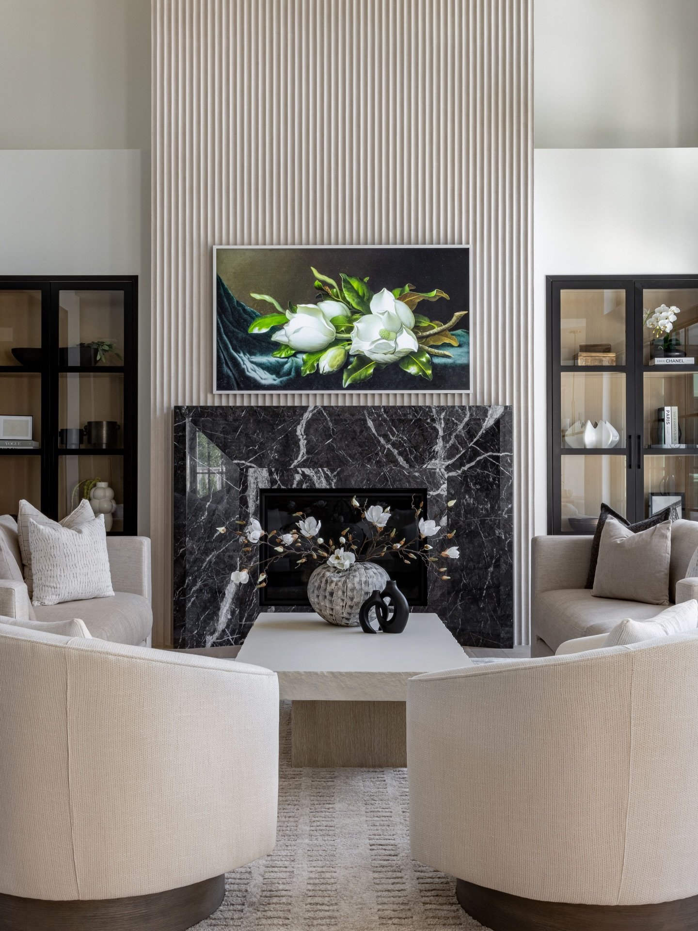 Grigio Carnico marble was an easy choice for this fireplace surround. The depth of the black stone mixed with the soft white veining brings just the right amount of contrast, grounding the space while still adding movement and interest to the great r