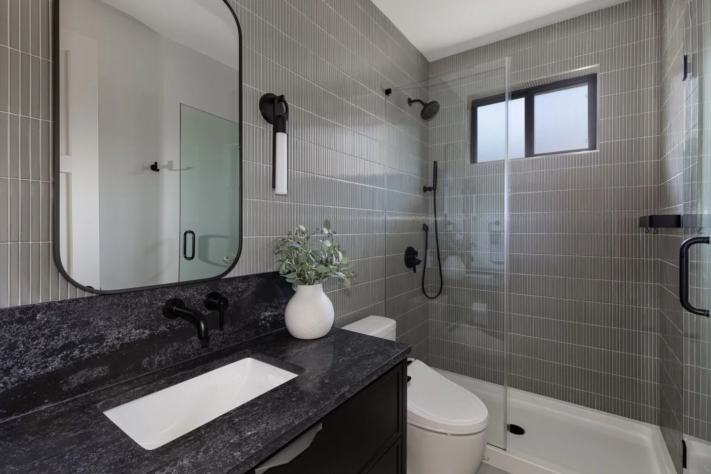 Extending tile beyond the shower and onto surrounding walls makes a huge impact. When the budget allows, it&rsquo;s one of our favourite ways to create a more polished finish in a bathroom!

Interior Designer: @centrestagedesign 
Photographer: @ana__
