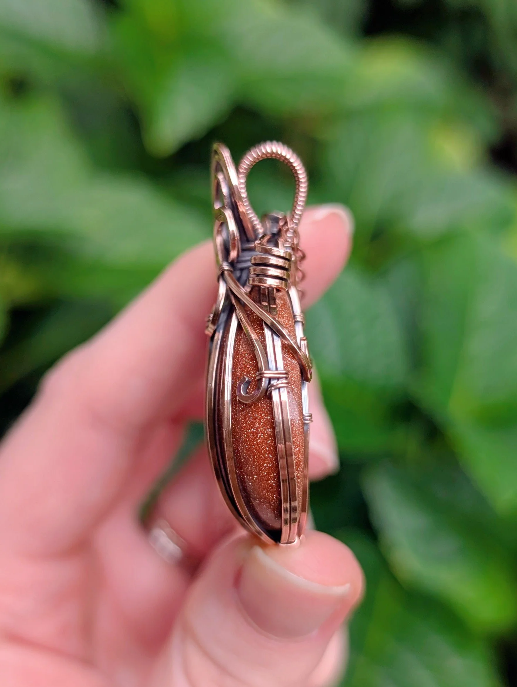 side of Statement Pumpkin Necklace with Goldstone in Copper