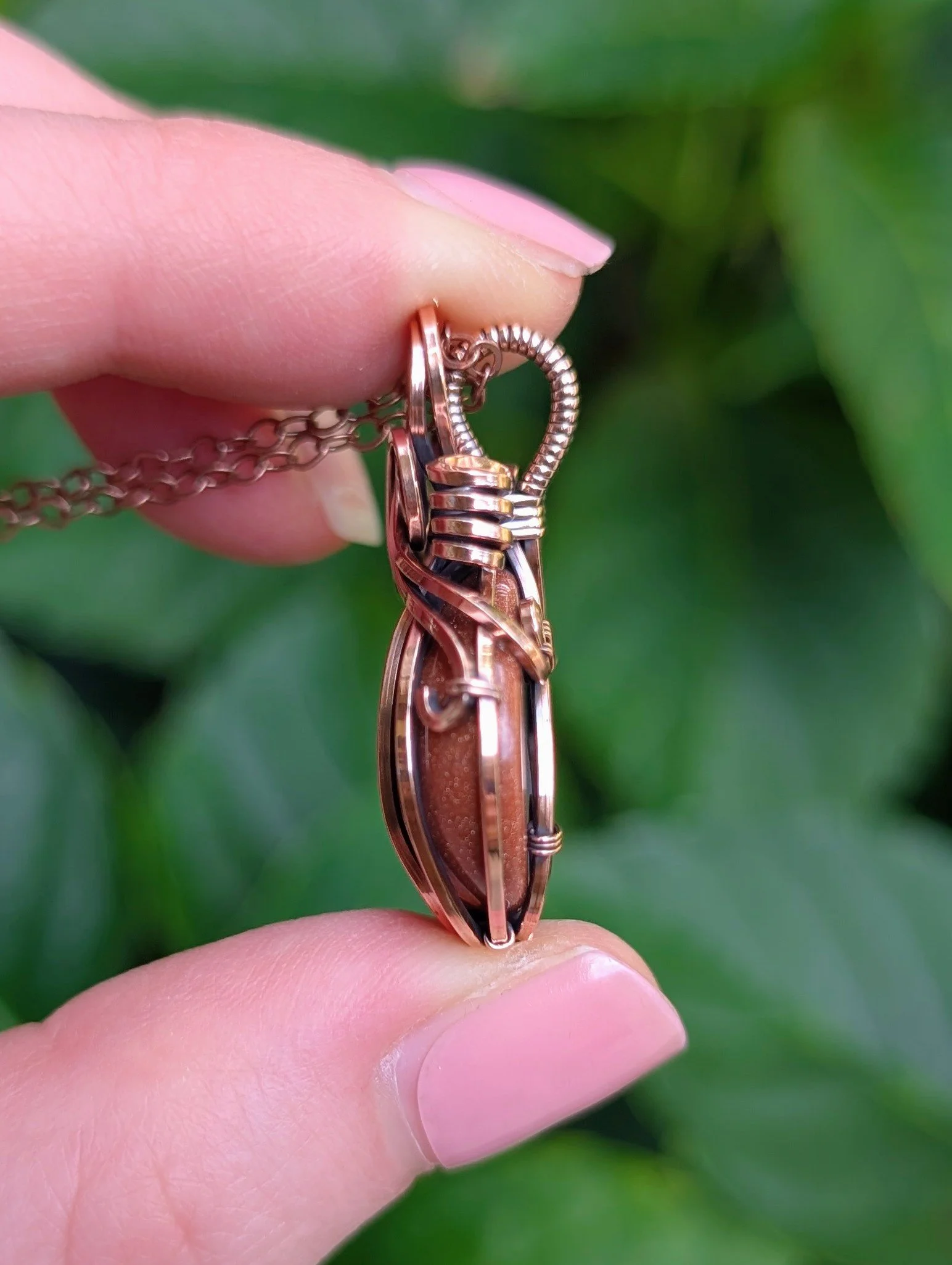 side of The Pumpkin Necklace with Goldstone in Copper