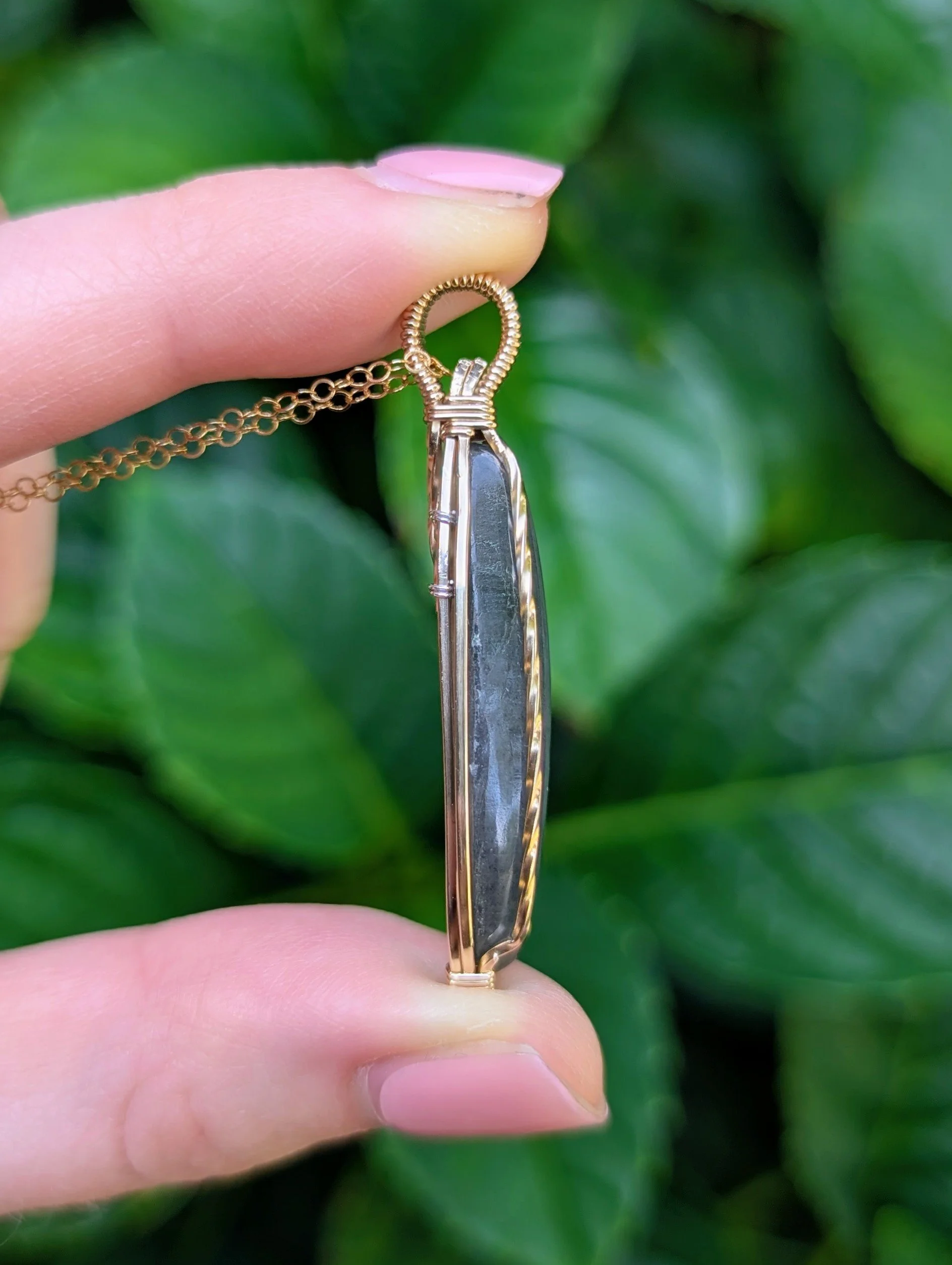 side of The Petal Necklace with Orange Labradorite in 14k Gold Filled
