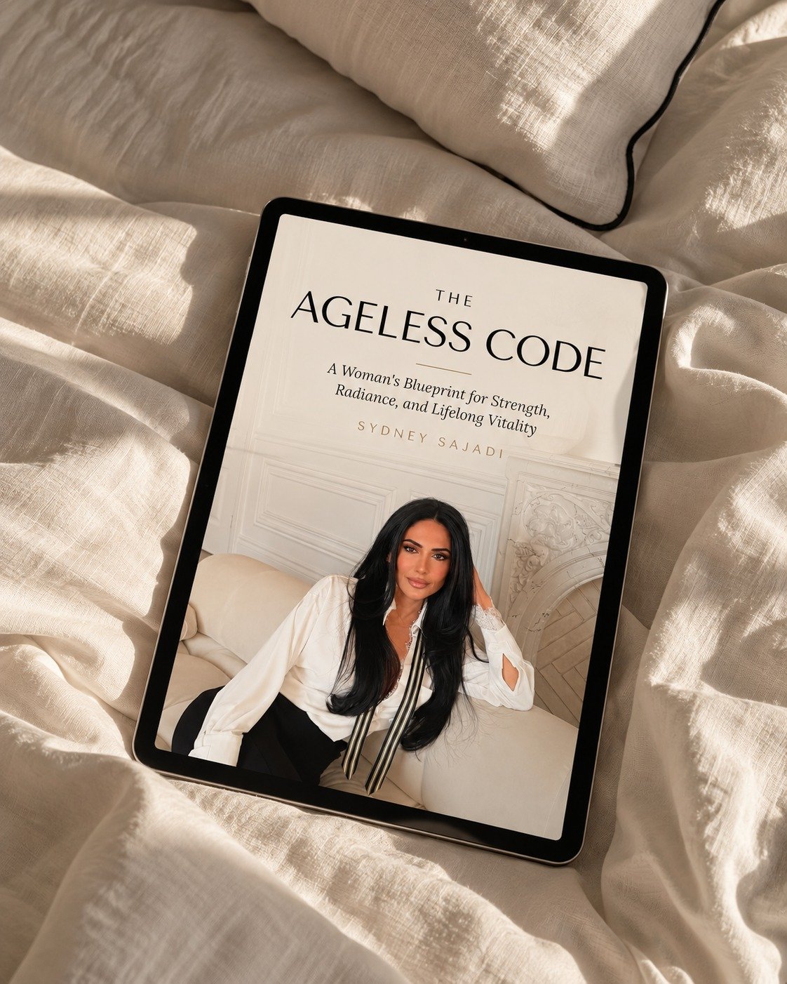 The Ageless Code e-book by Sydney Sajadi shown on an iPad