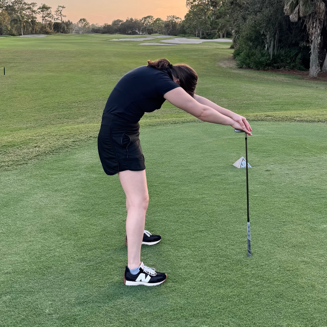 Standing Cat Pose Warm Up with Golf Club