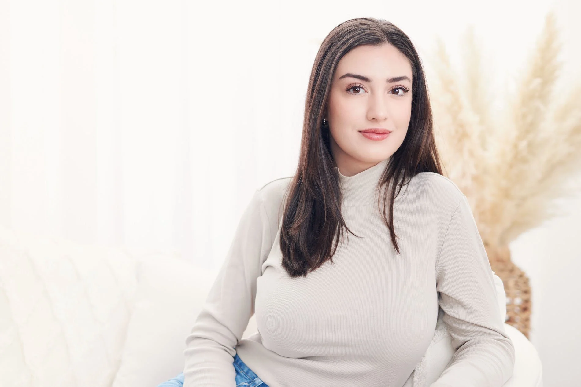 Light background lifestyle branding photoshoot of young woman