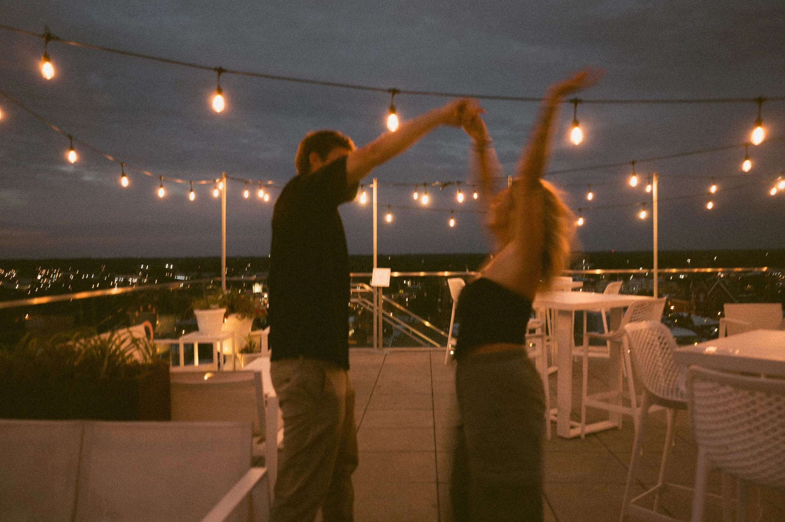 Rooftop Surprise Proposal at Quirk Hotel | Richmond, VA Engagement Photographer