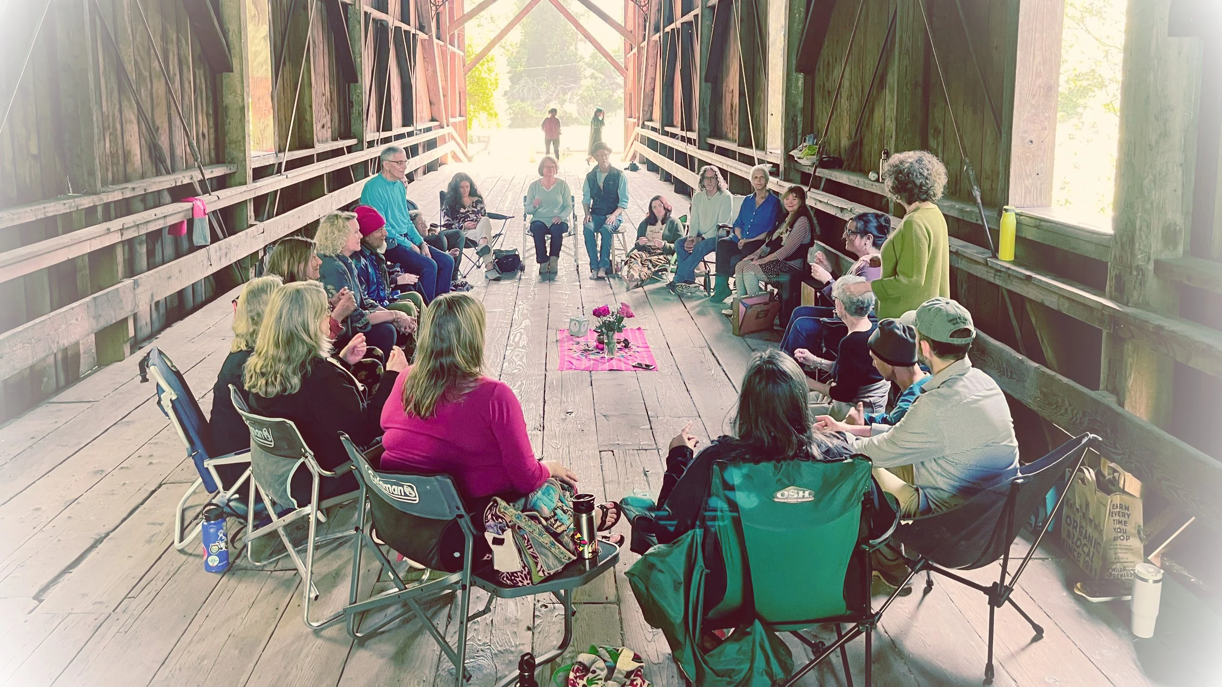 Bridge Songs community choir gathered in a singing circle at the Felton Covered Bridge.