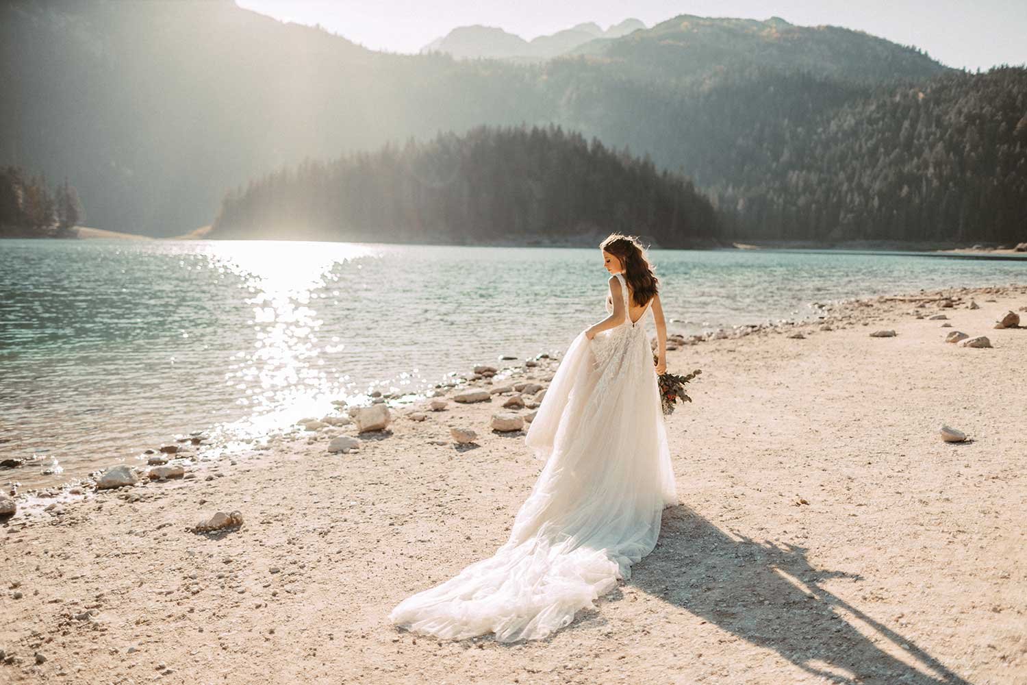 Bride-posing-in-Montenegros-lake.jpg