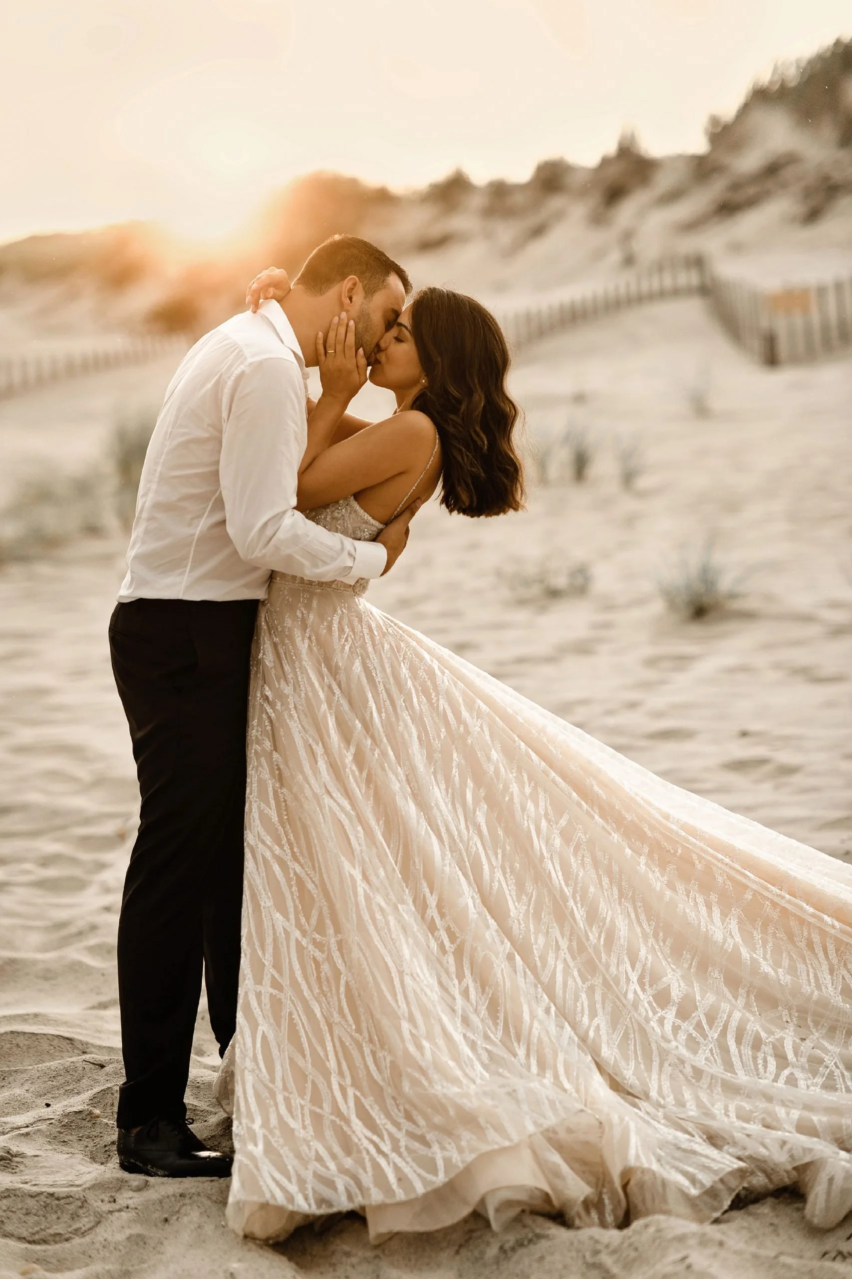 Bride-and-groom-kissing-at-The-Hamptons-beach-scaled.jpg