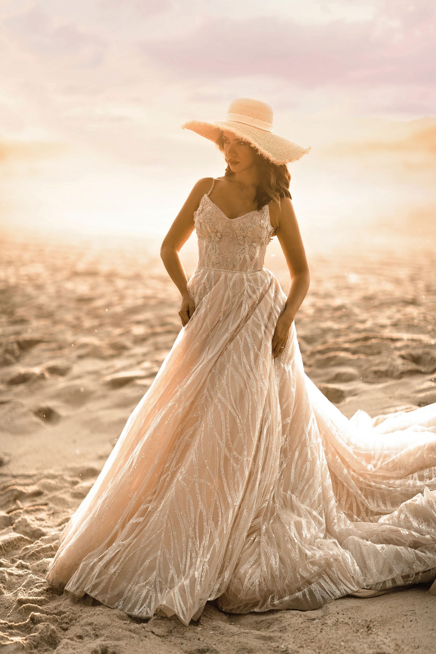Bride-posing-for-the-beach-wedding-photoshoot-scaled.jpg