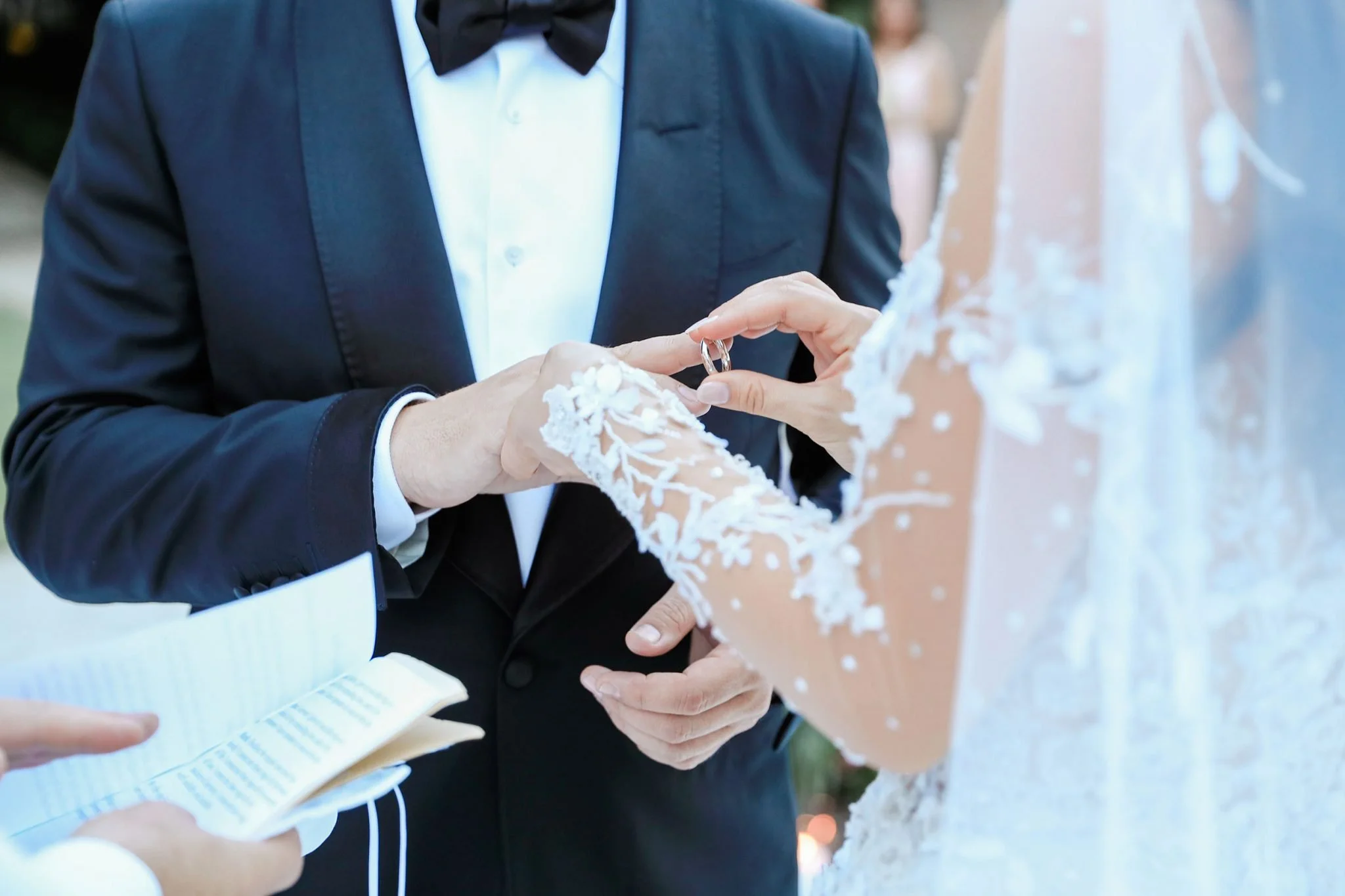 Bride-and-groom-exchanging-wedding-rings-photos-2048x1366.jpg