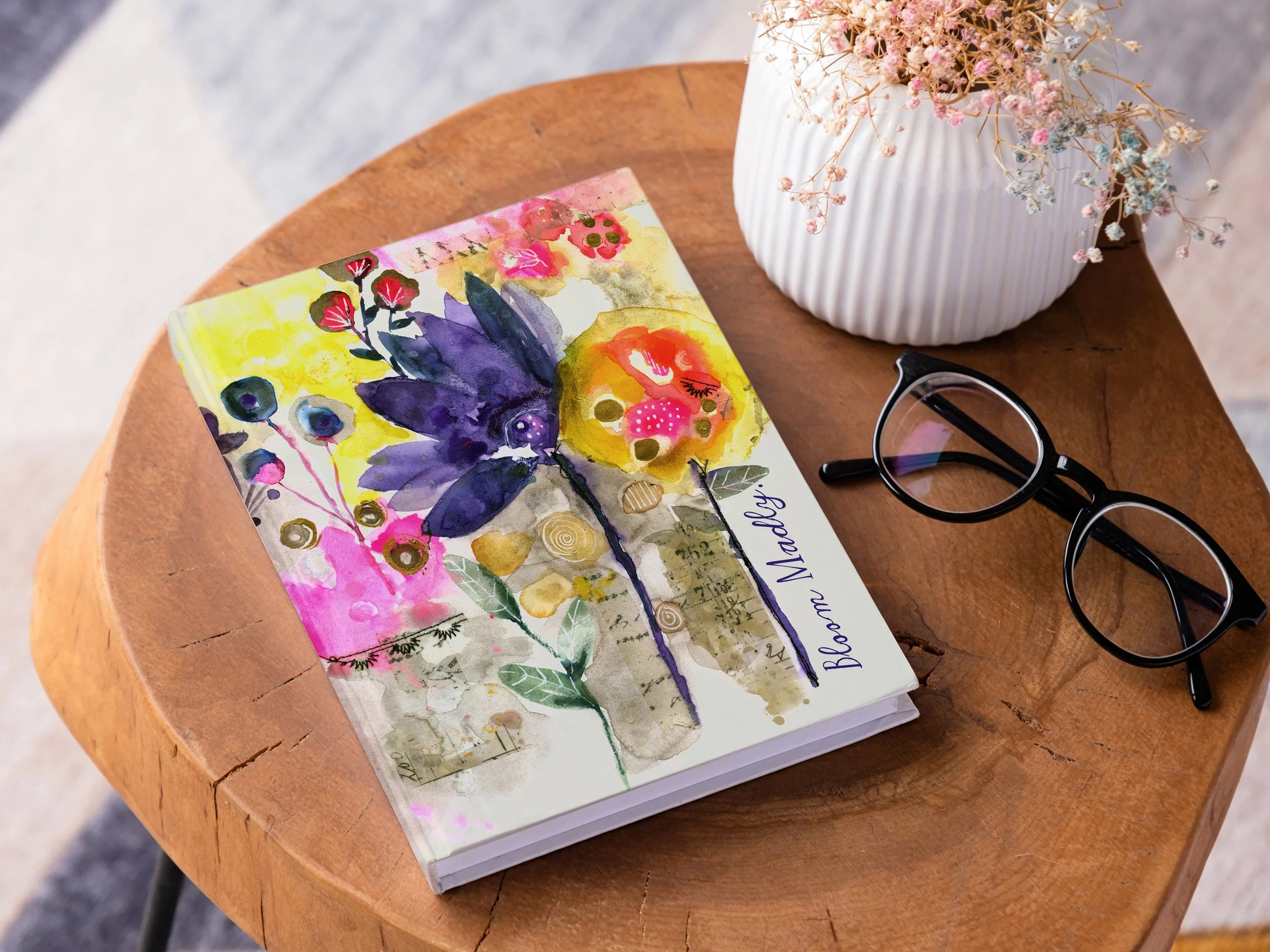 blank-book-mockup-coffee-table-with-decoration-flowers-colorful-rug copy.jpg