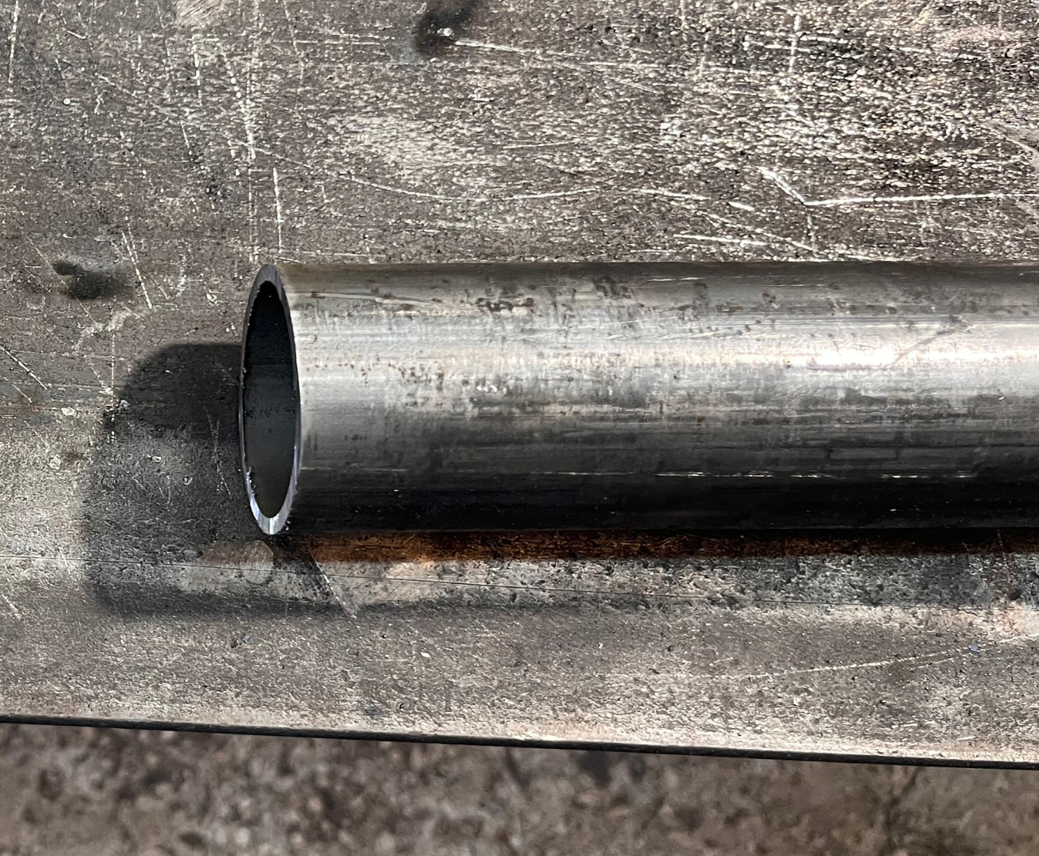 a cut piece of 2" round tubing