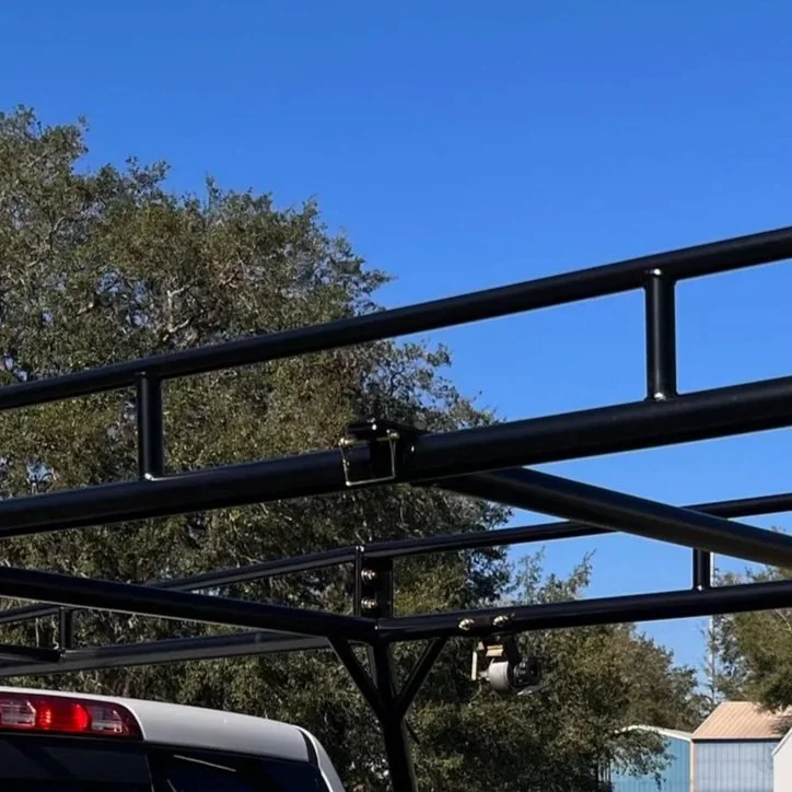 zoomed in photo of a Sterling truck rack showing the cargo side rails from the side