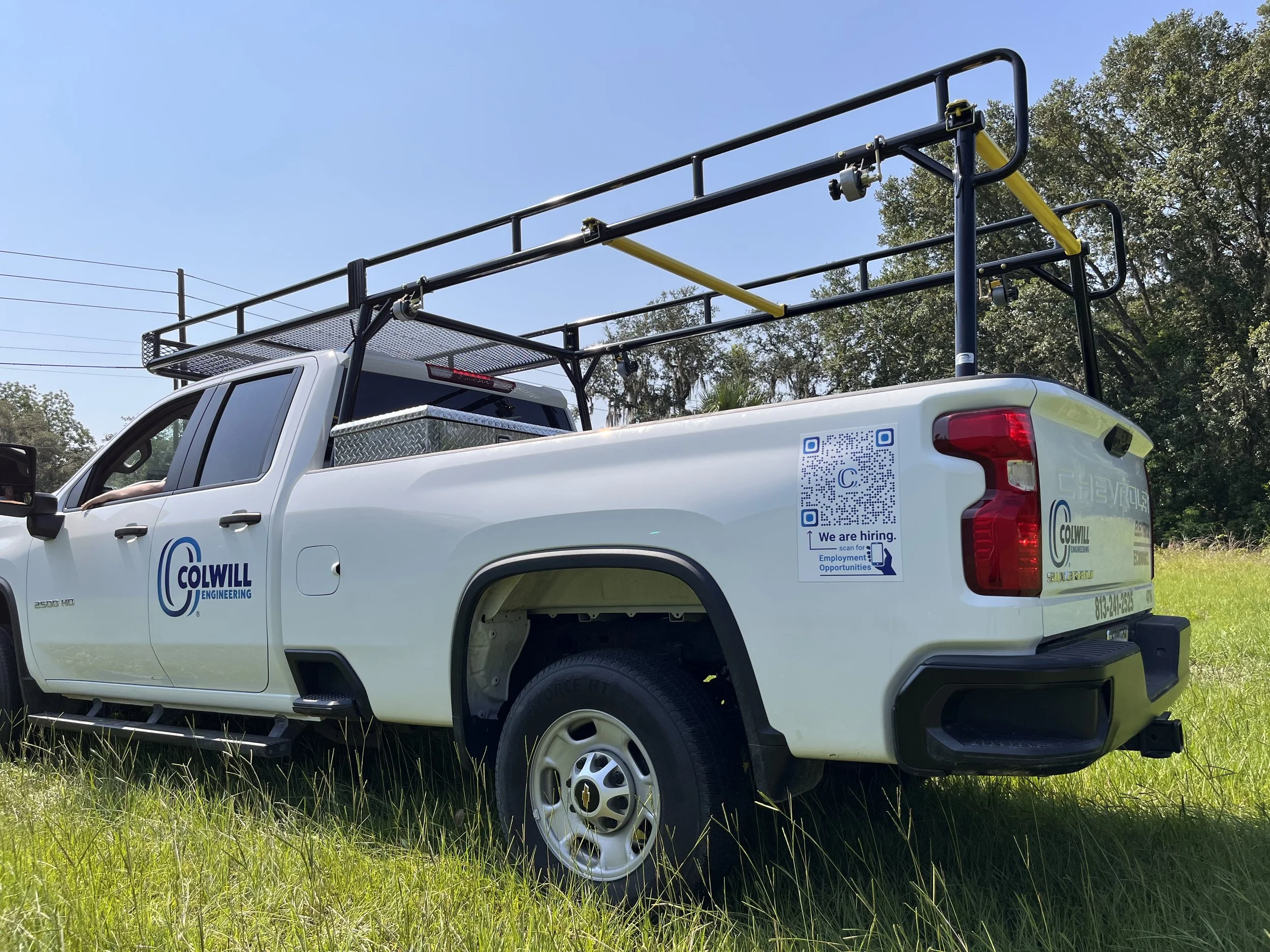 Sterling truck rack with yellow bed cross over bars