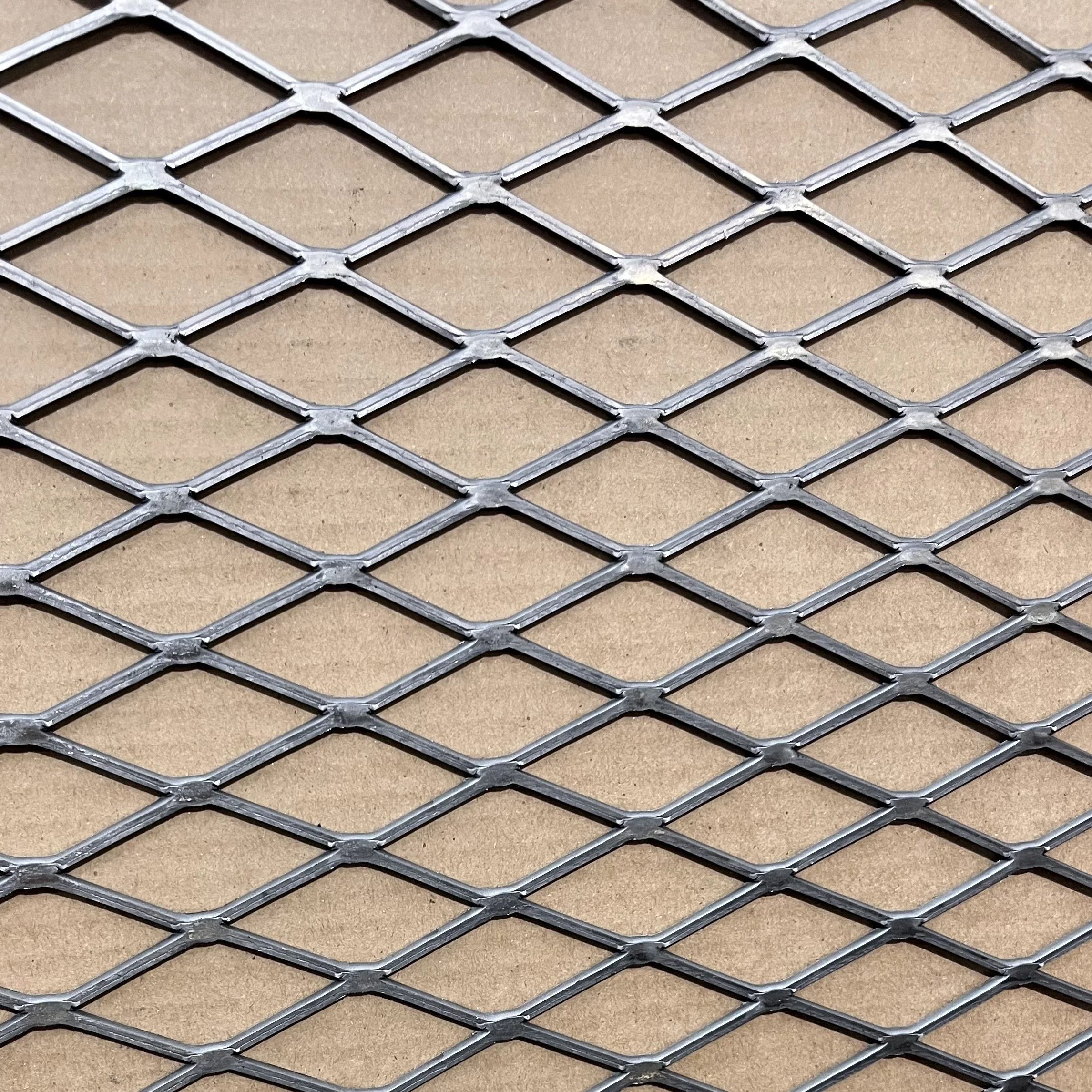 1.5" #9 expended steel mesh showing the diamond size