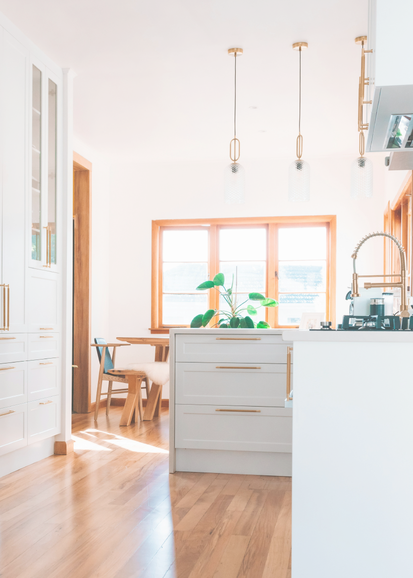 Kitchen interior design with natural materials and warm finishes.