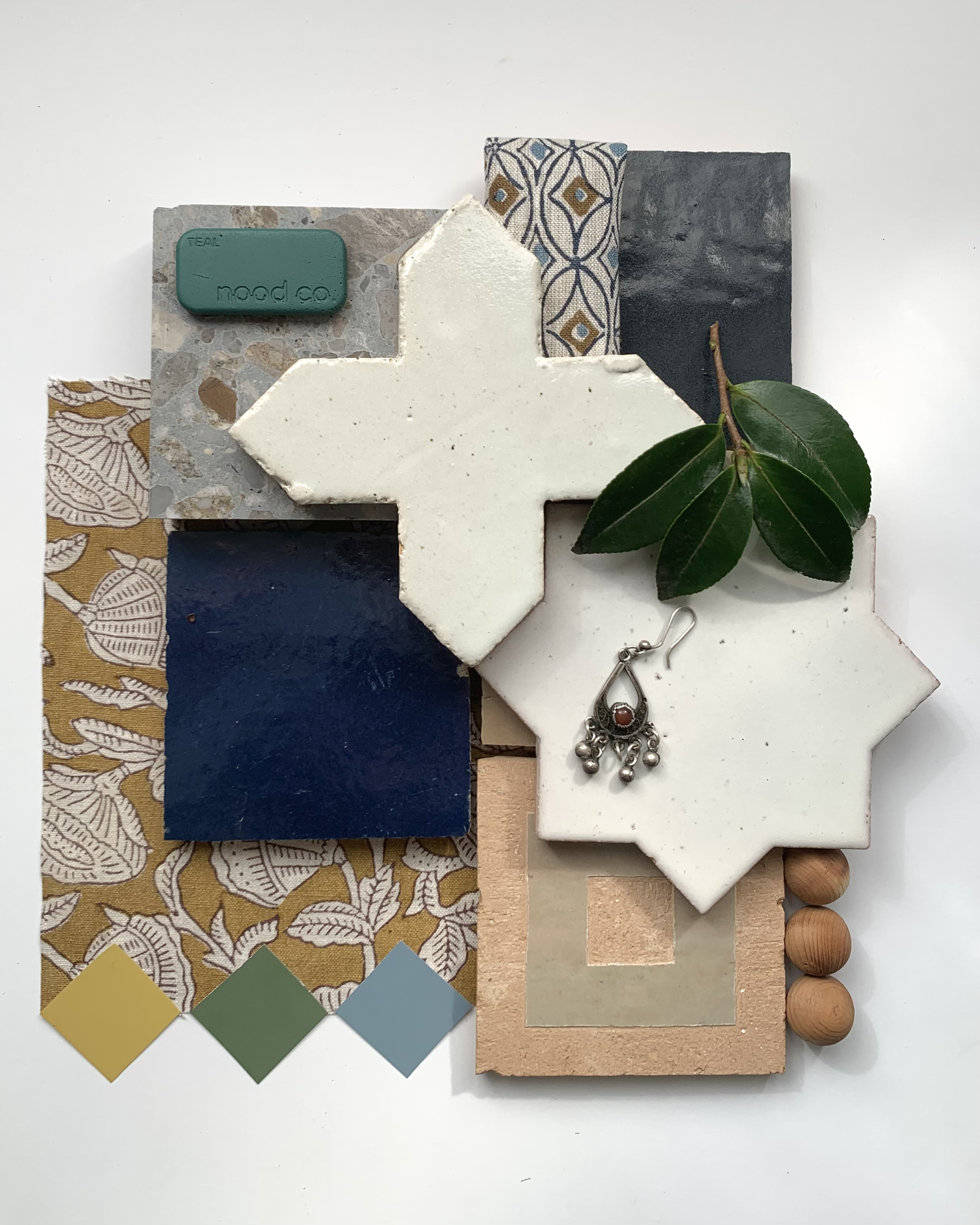 Materials and finishes selection  — a coastal family home in Newcastle. Indigo, ochre and natural timber tones layered with ceramic tile, woven texture and stone. Residential interior design by Oliv Interiors.