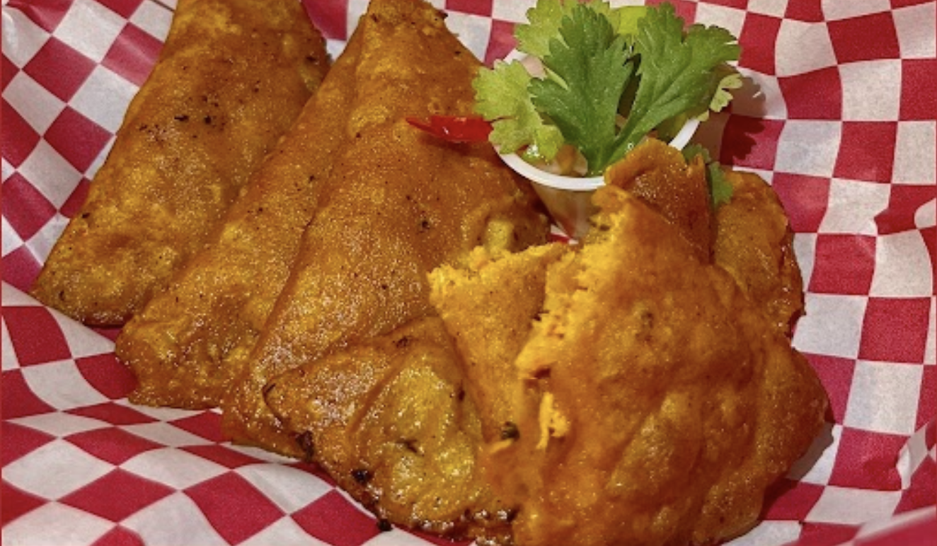 A close up photo of beliezian food, panades.