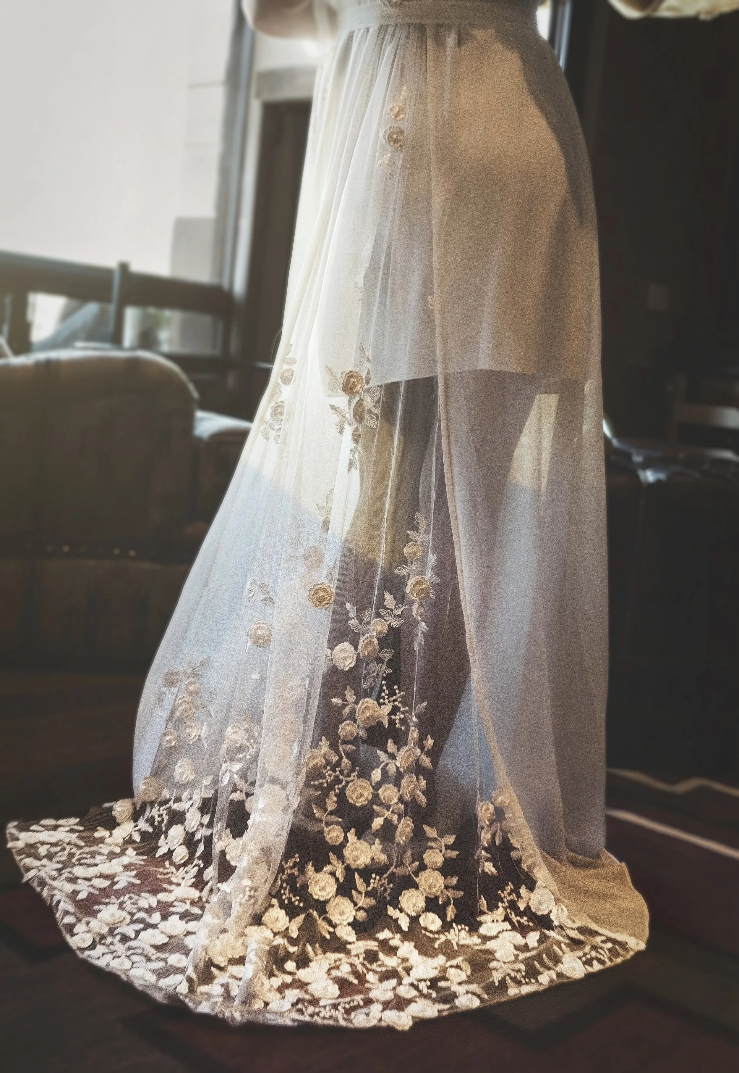 Elegant wedding robe, lace, cinematic lighting, Steamboat Springs, Colorado, editorial