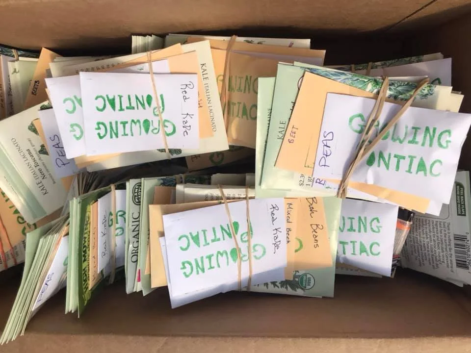 A box of seeds with Growing Pontiac stamped on them