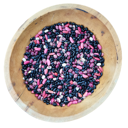 Pink and black beans in a wooden bowl