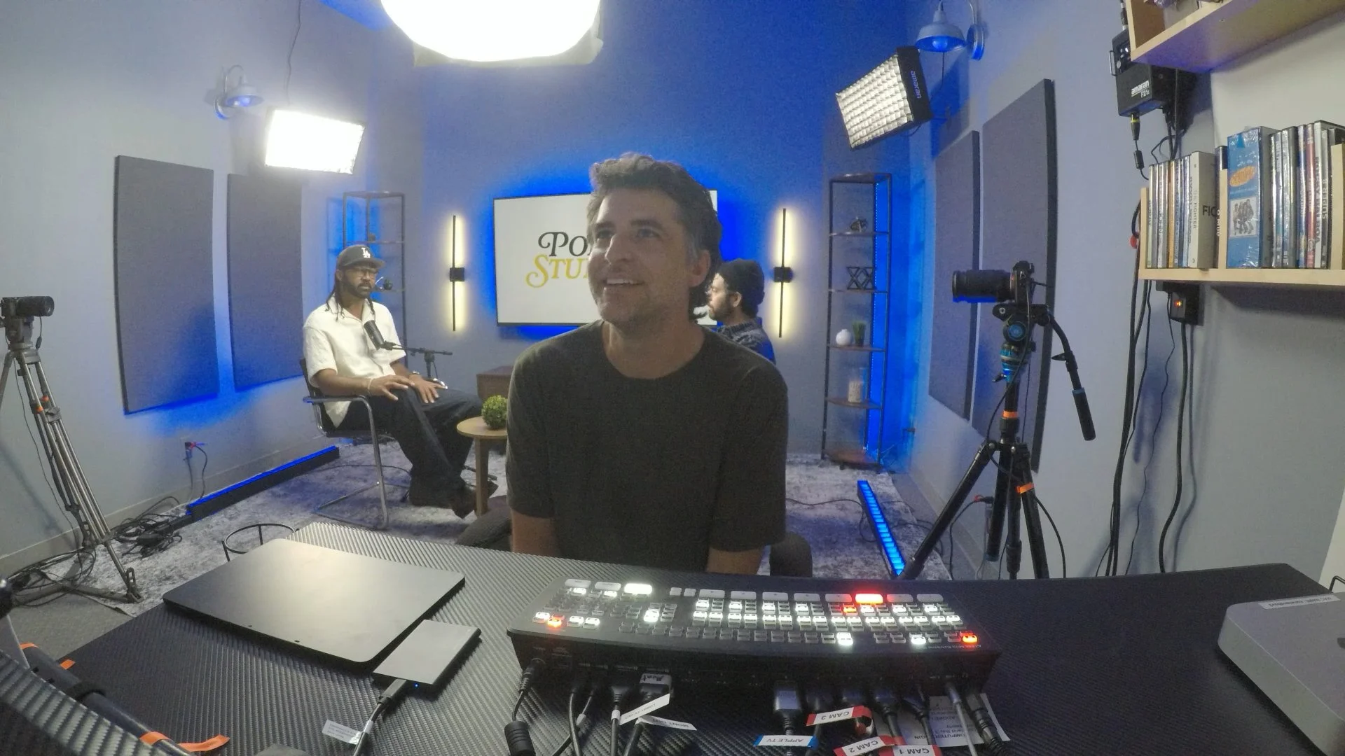 Cinematic red lighting on a video podcast set in Los Angeles