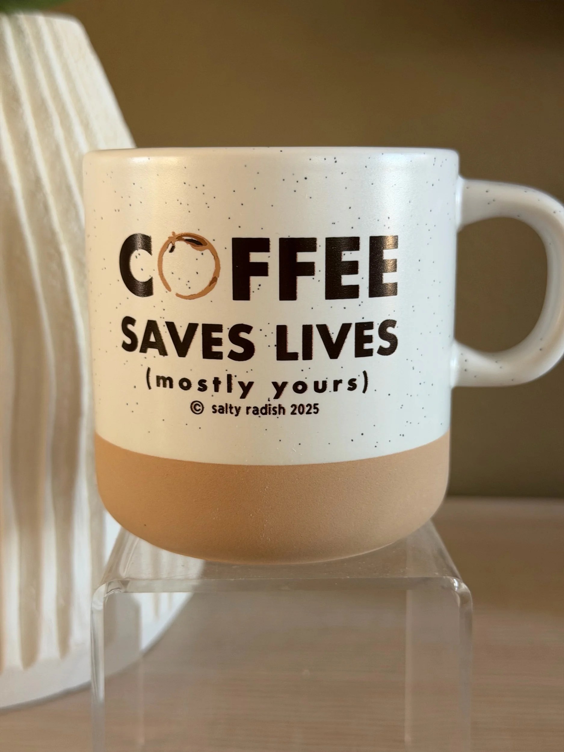 Neutral two toned mug with speckled glazed and baked bottom