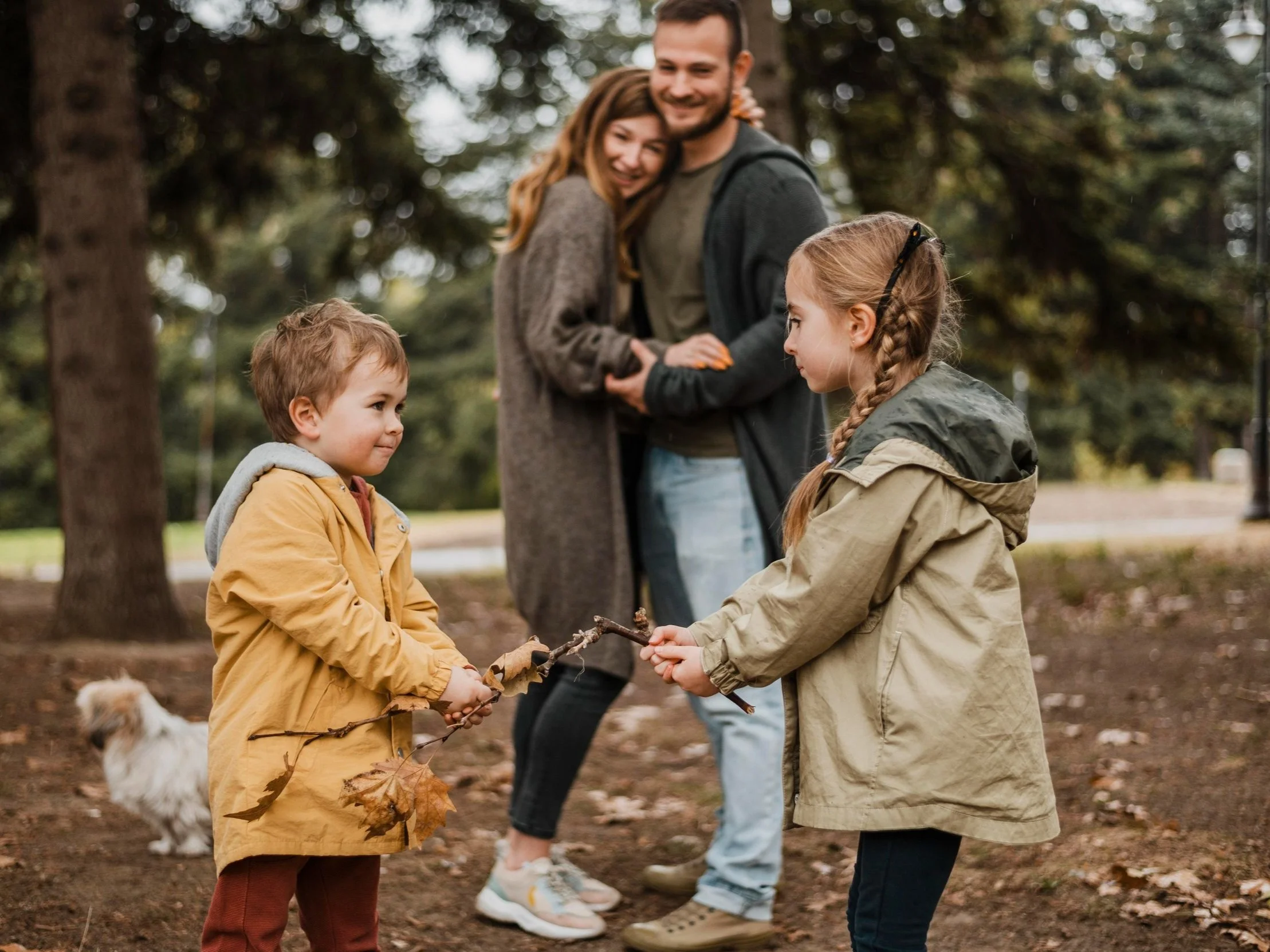 medium-shot-happy-parents-watching-children+%281%29.jpg