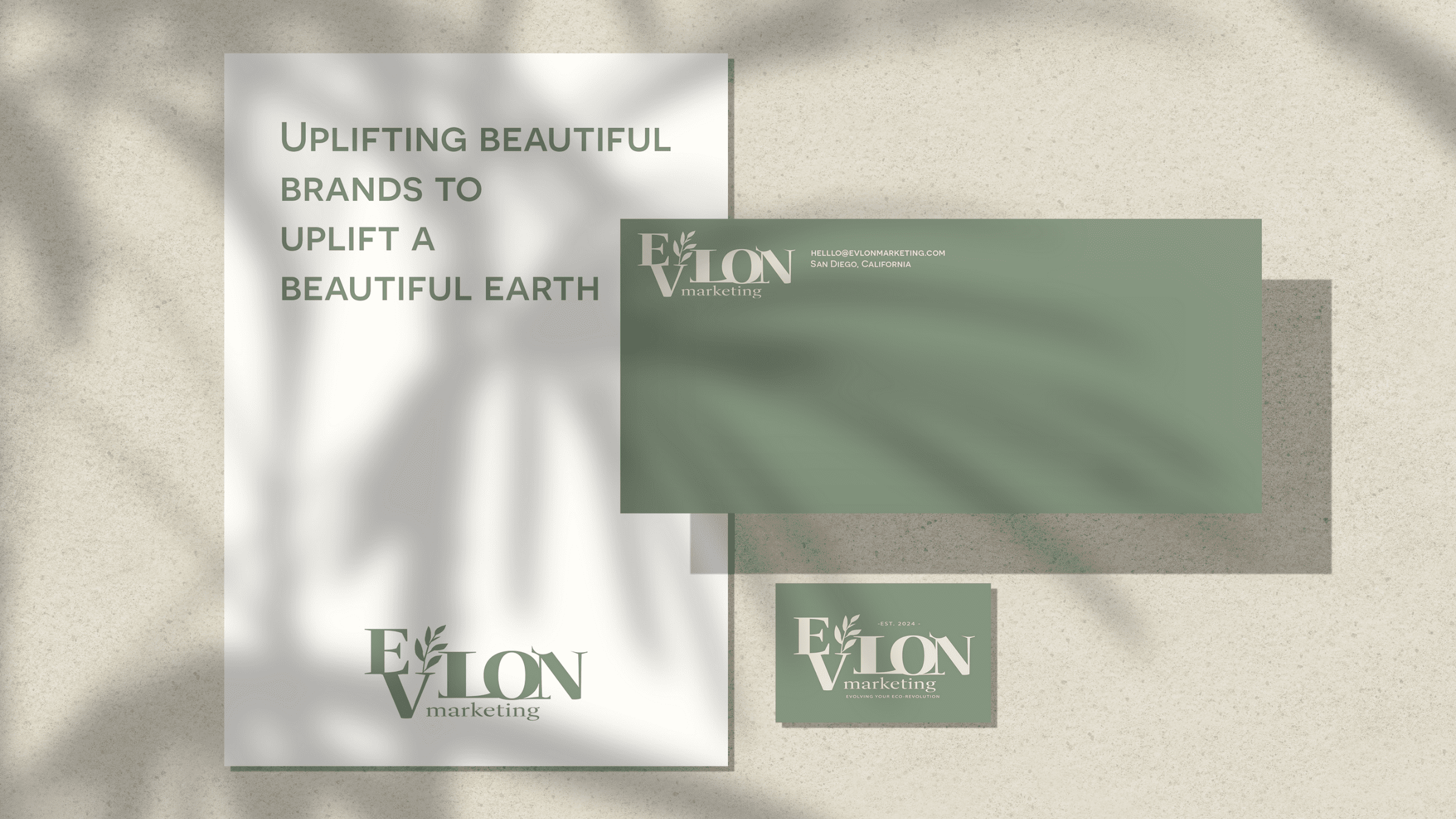 Multiple marketing logos with the word 'ELEVON' and an olive branch, with the tagline 'Evolving Your Eco-Revolution' and contact email hello@evlonmarketing.com, on a beige textured background.