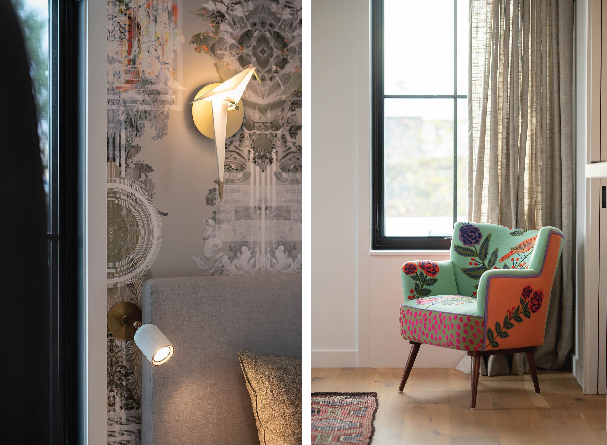 Interior design with decorative wall sconce, gray headboard, colorful upholstered chair, window curtains, and patterned rug on hardwood floor.