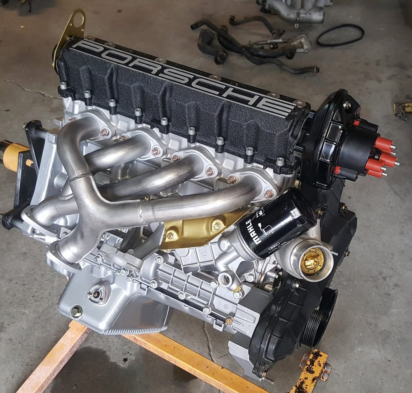 Porsche engine with visible manifold and distributor