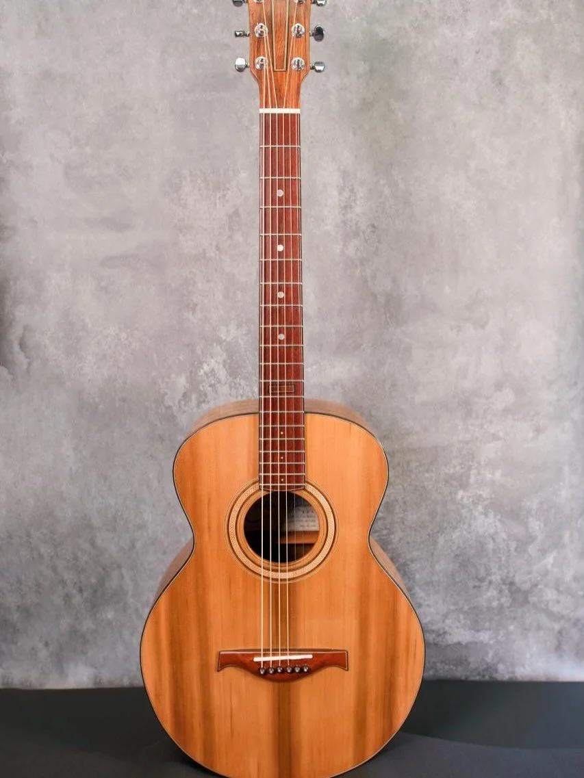 My latest Blues Mountain model has made its way to its forever home. Small-bodied and falcate-braced, this completely hand crafted acoustic guitar offers a warm and full cedar-and-blackwood voice with strong projection. The golden-toned Blackwood bac