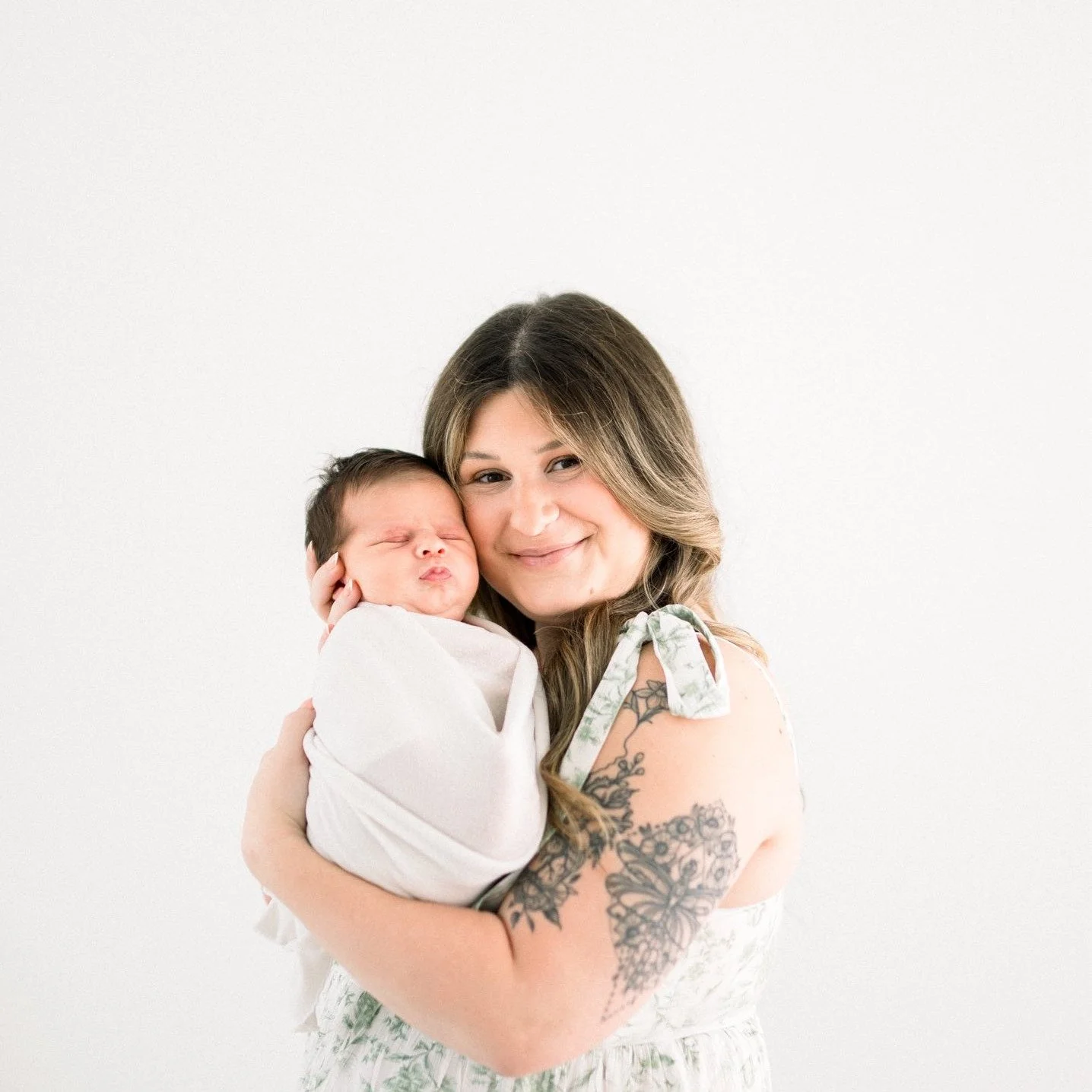 mom holdiing her baby