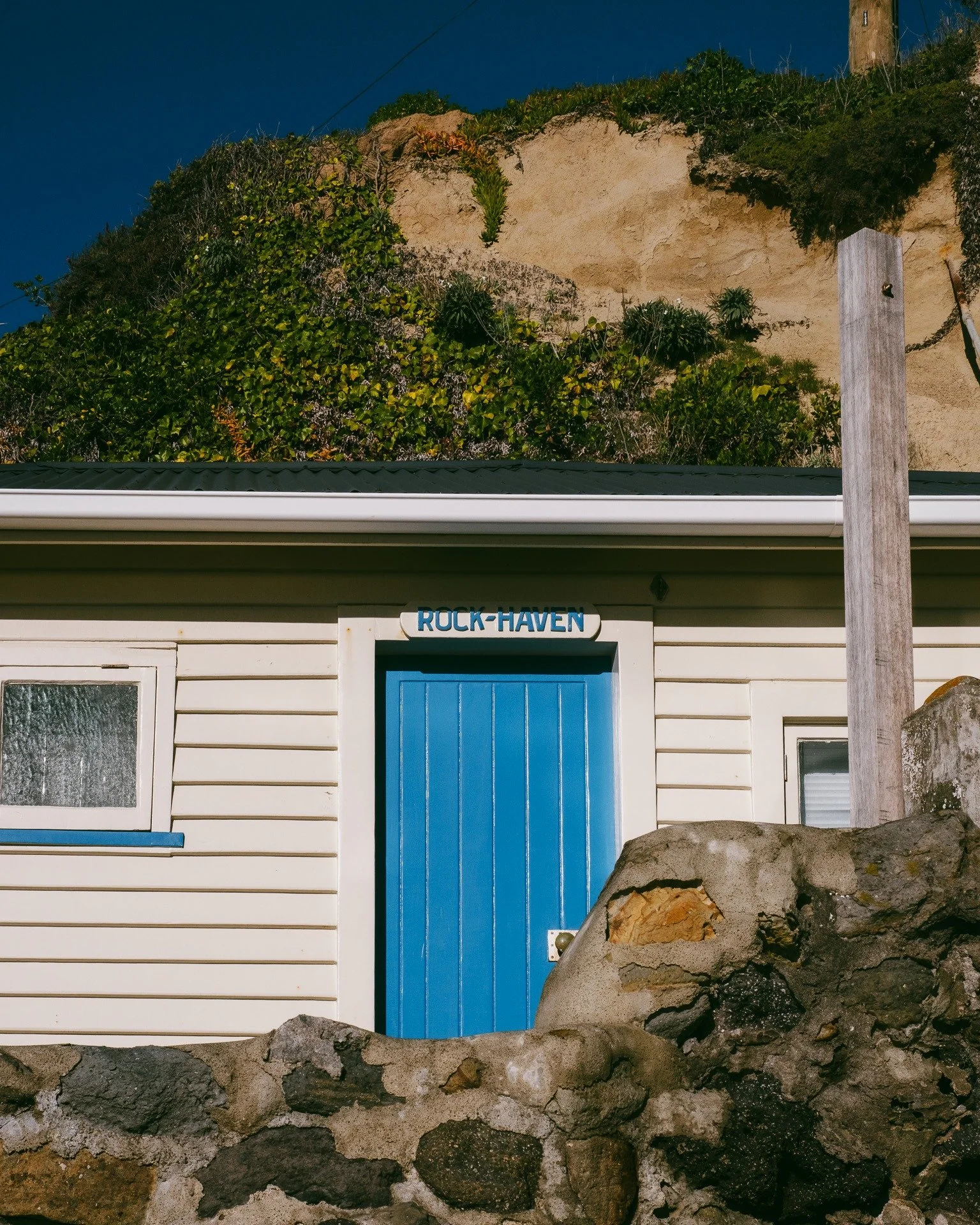 Some baches at Te Onepoto (Taylors Mistake) have stood the test of time better than others. Elevated marginally above the rockpools and bathed in sunlight, Rockhaven captures the essence of the bach &mdash; a simple, unpretentious shelter imbued with