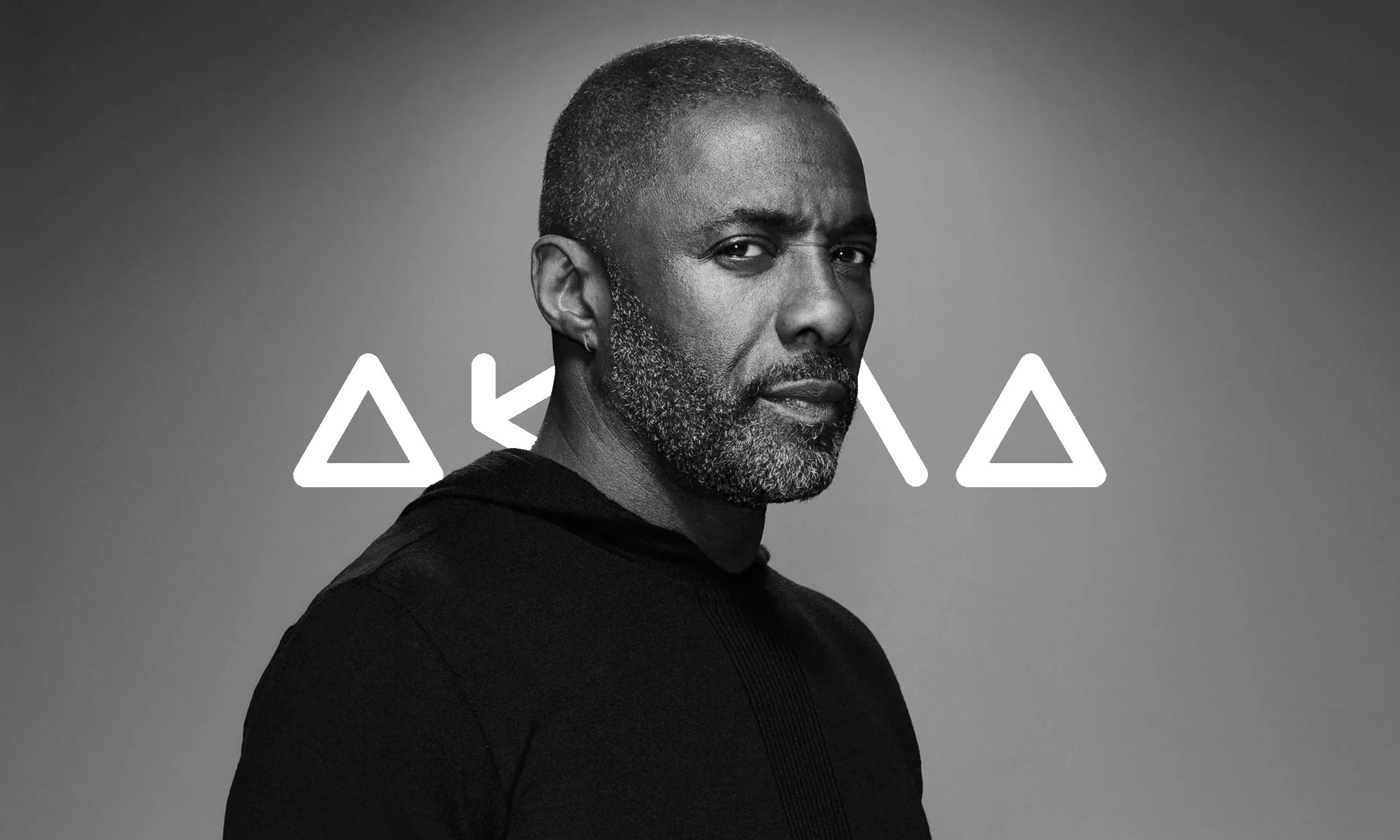 Akuna brand identity by Shapes — black and white portrait of Idris Elba, founder of the Akuna Group